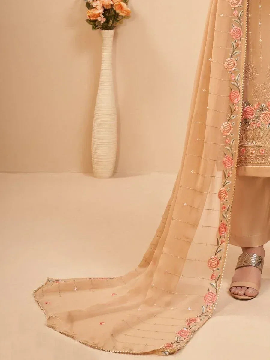 Beige embroidered dupatta with floral border, paired with ethnic salwar kameez, perfect for Indian occasions.