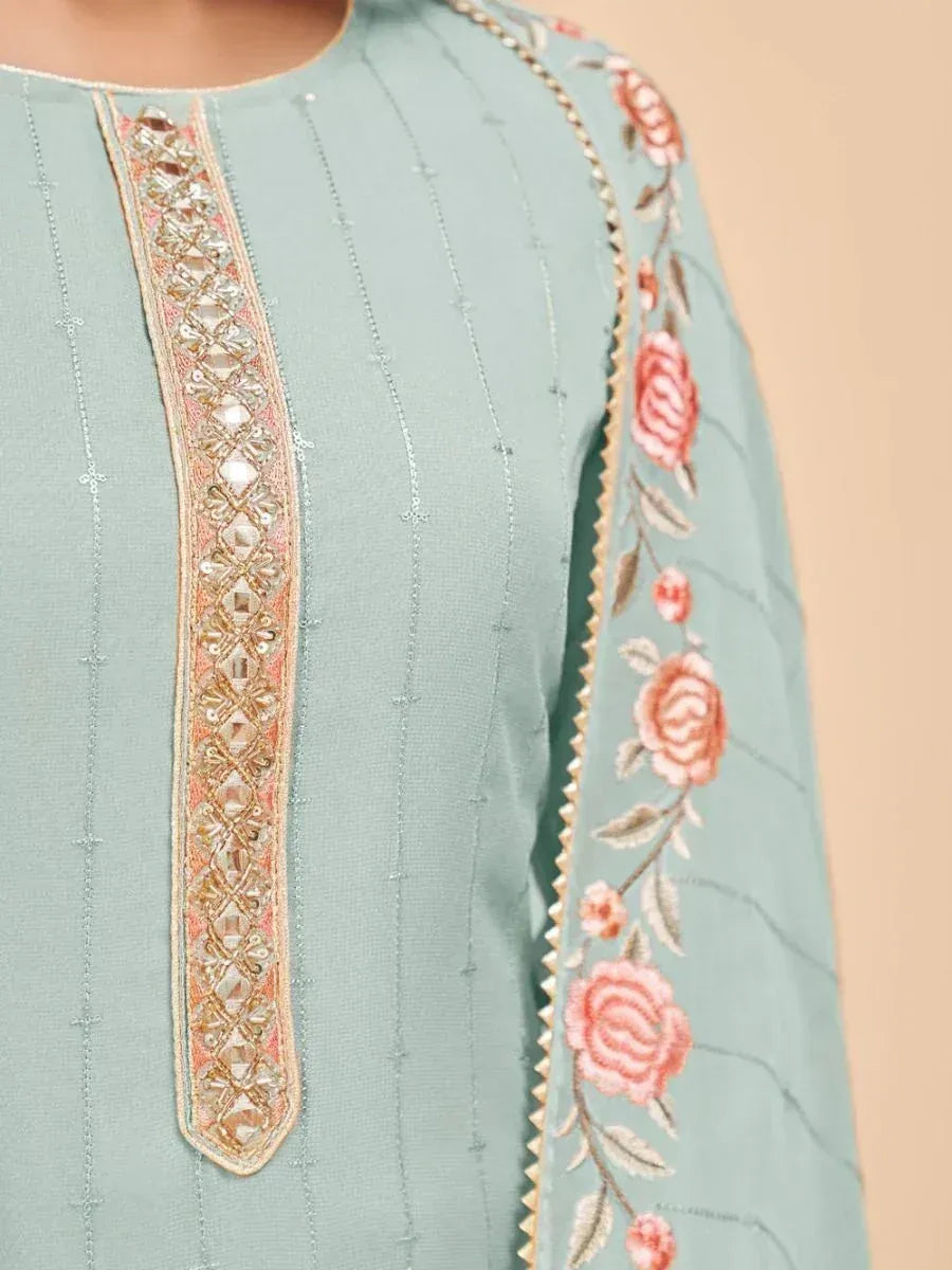 Mint green embroidered kurta with mirror work placket and floral sleeve detailing