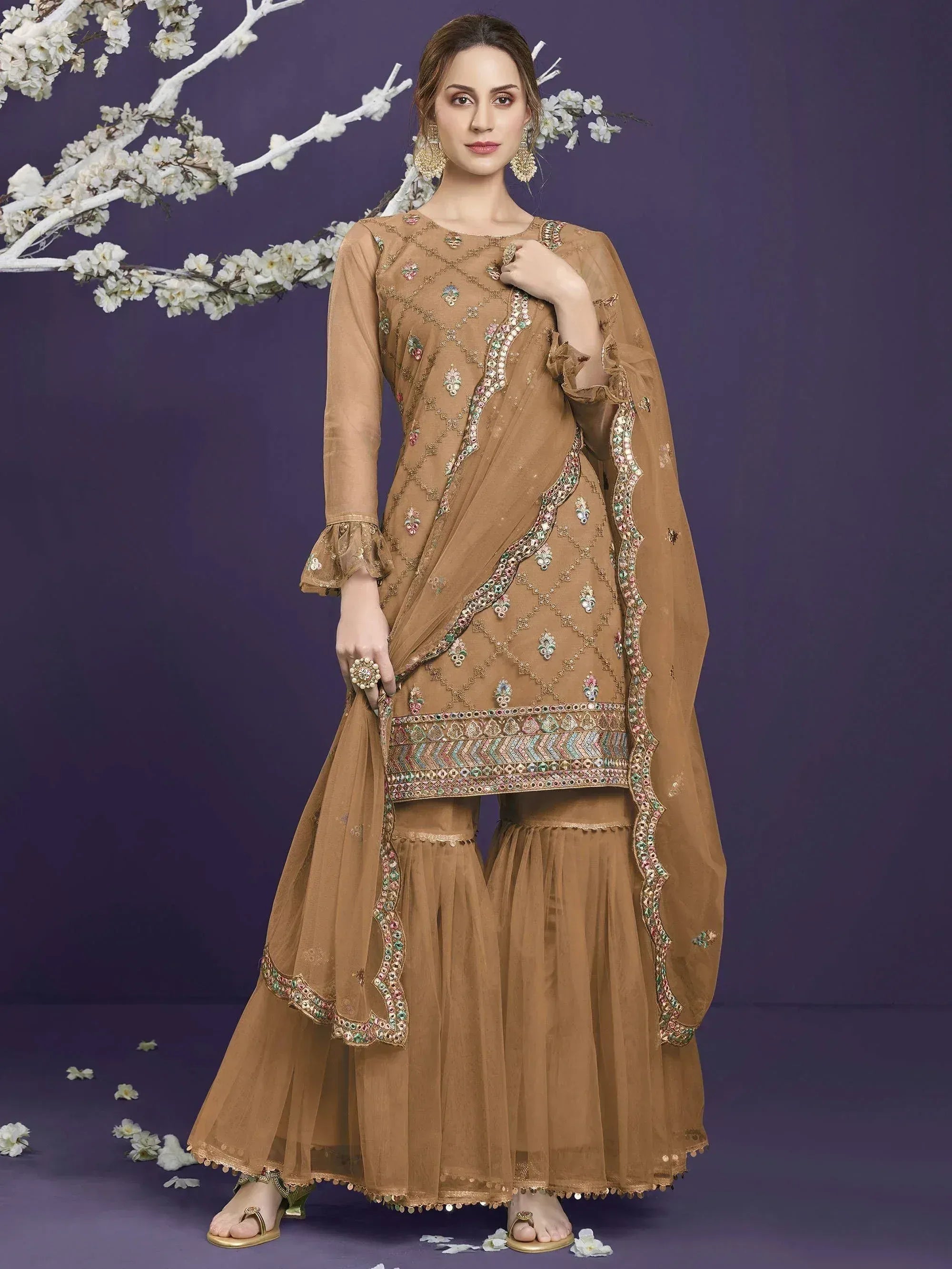 Elegant brown embroidered salwar kameez with flared pants and dupatta, perfect for festive occasions.