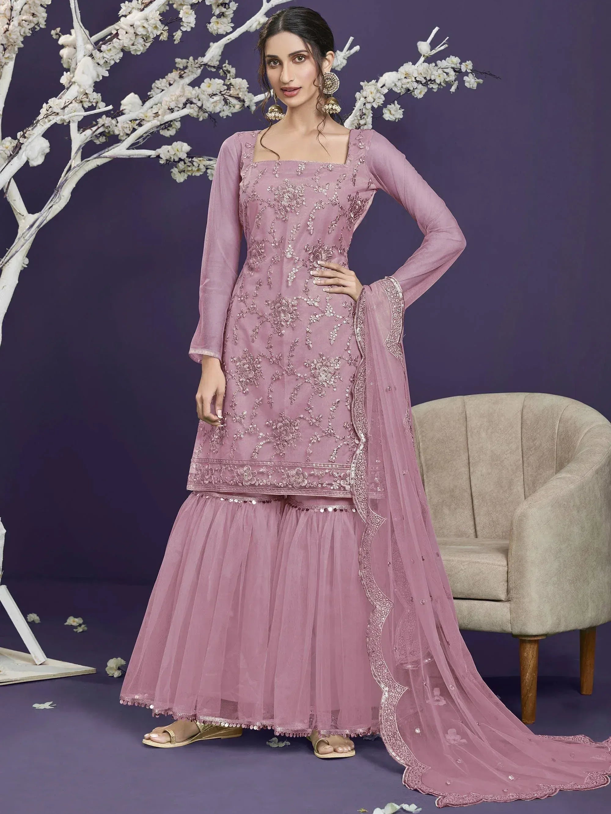 Pink embroidered ethnic gown with tulle skirt and dupatta, perfect for Indian weddings or festive occasions