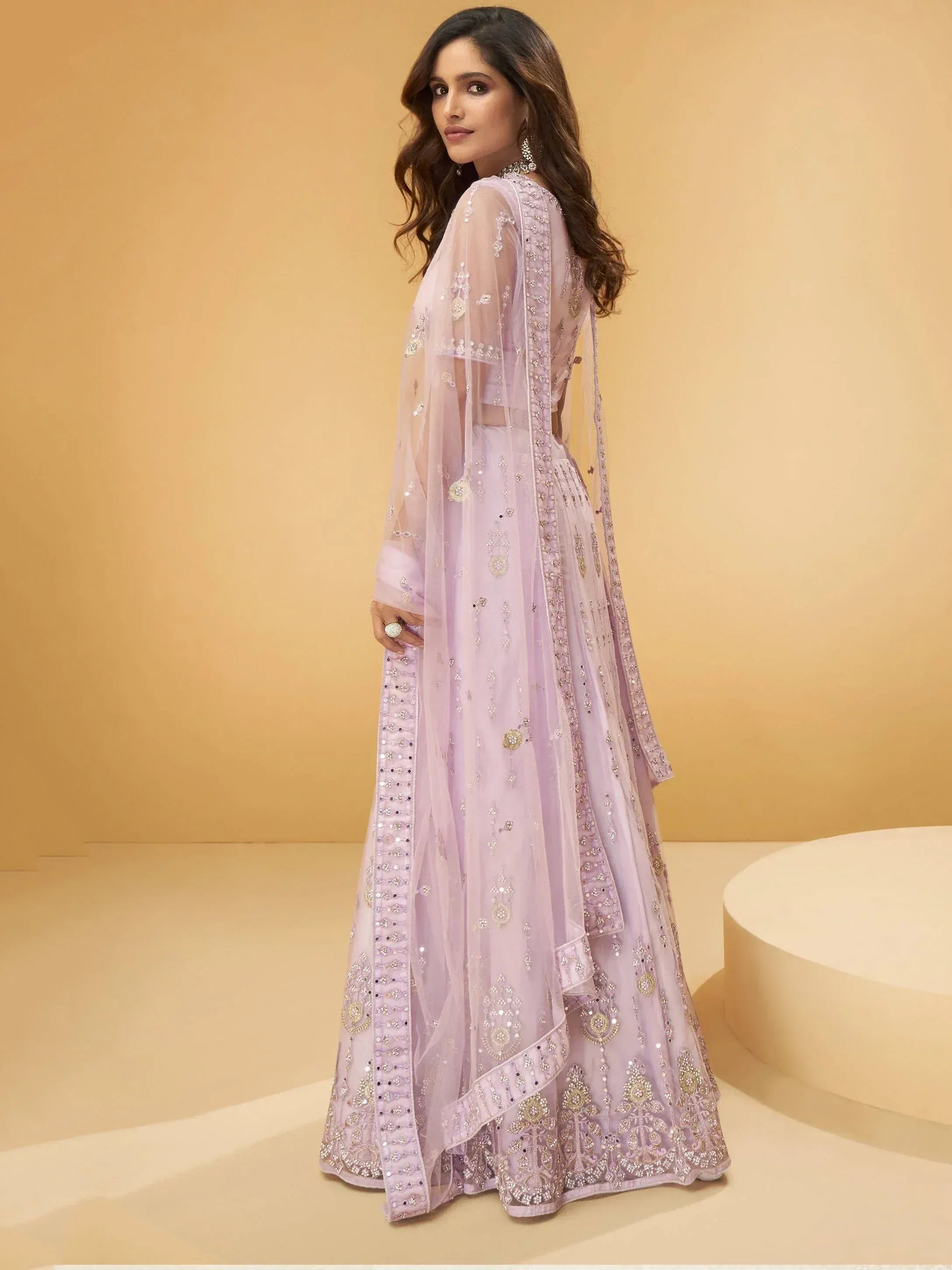 Lavender embroidered lehenga choli with sheer dupatta, perfect for Indian weddings and festive occasions.