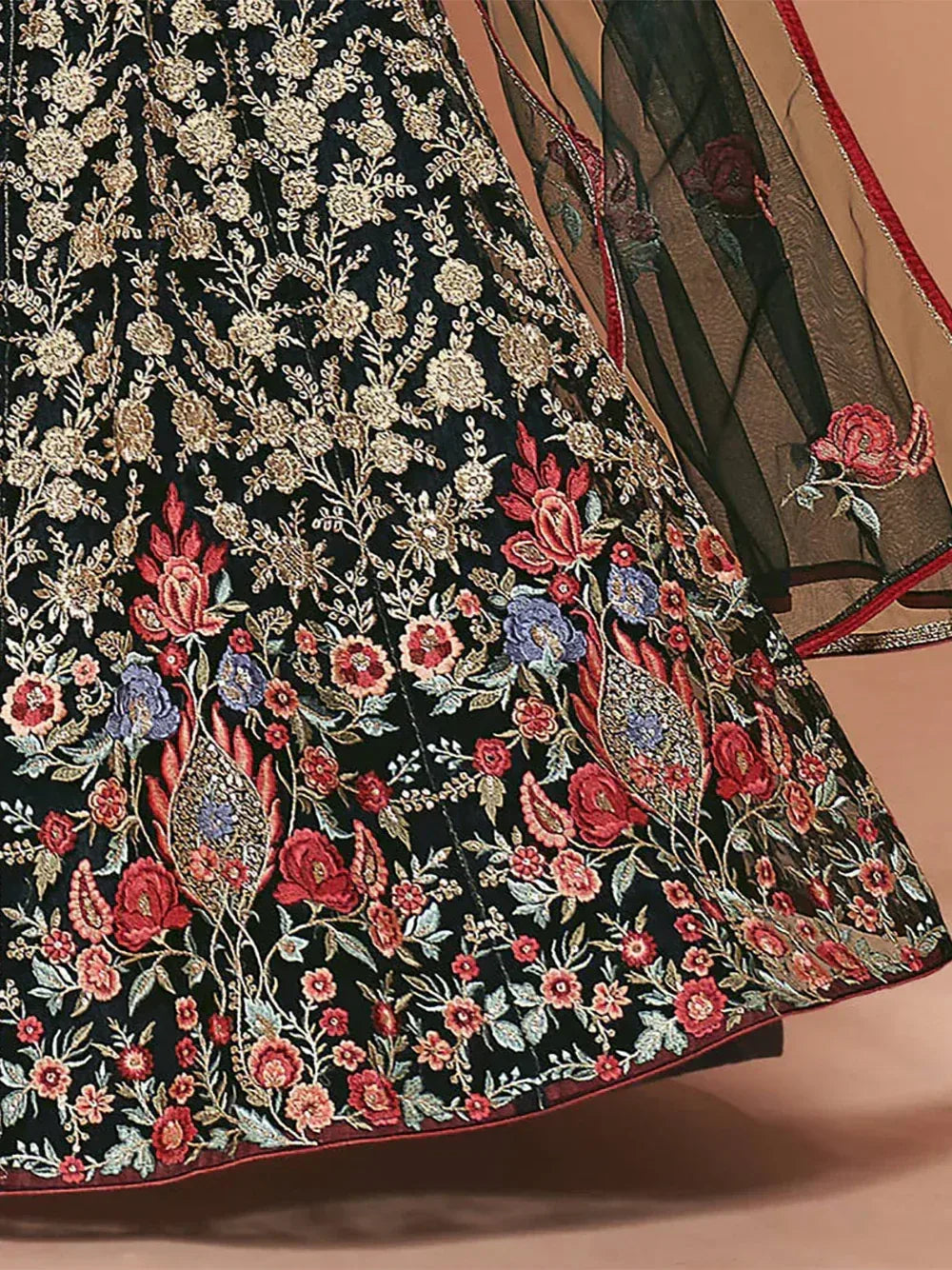 Black floral embroidered lehenga with red and gold detailing, perfect for Indian ethnic wear.