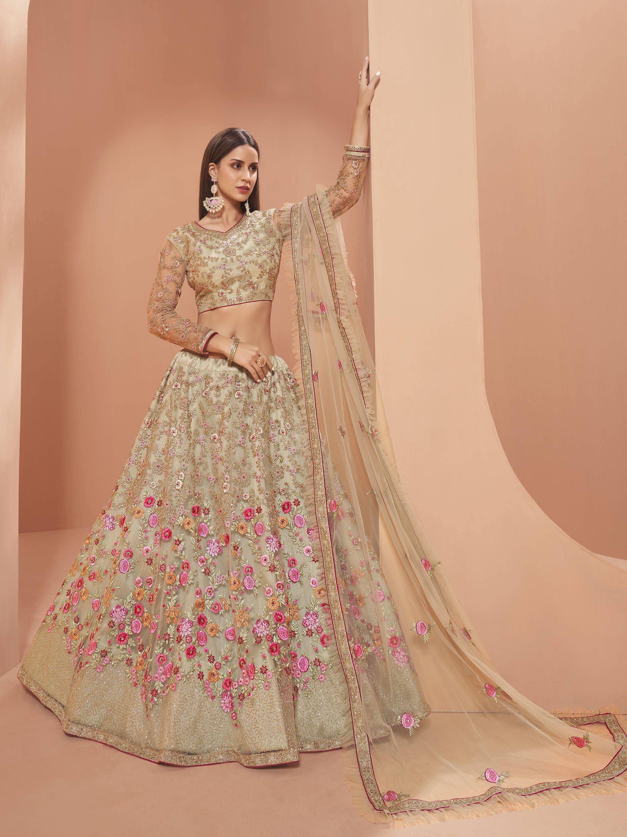 Designer lehenga choli with floral embroidery, perfect for Indian weddings and festive occasions.
