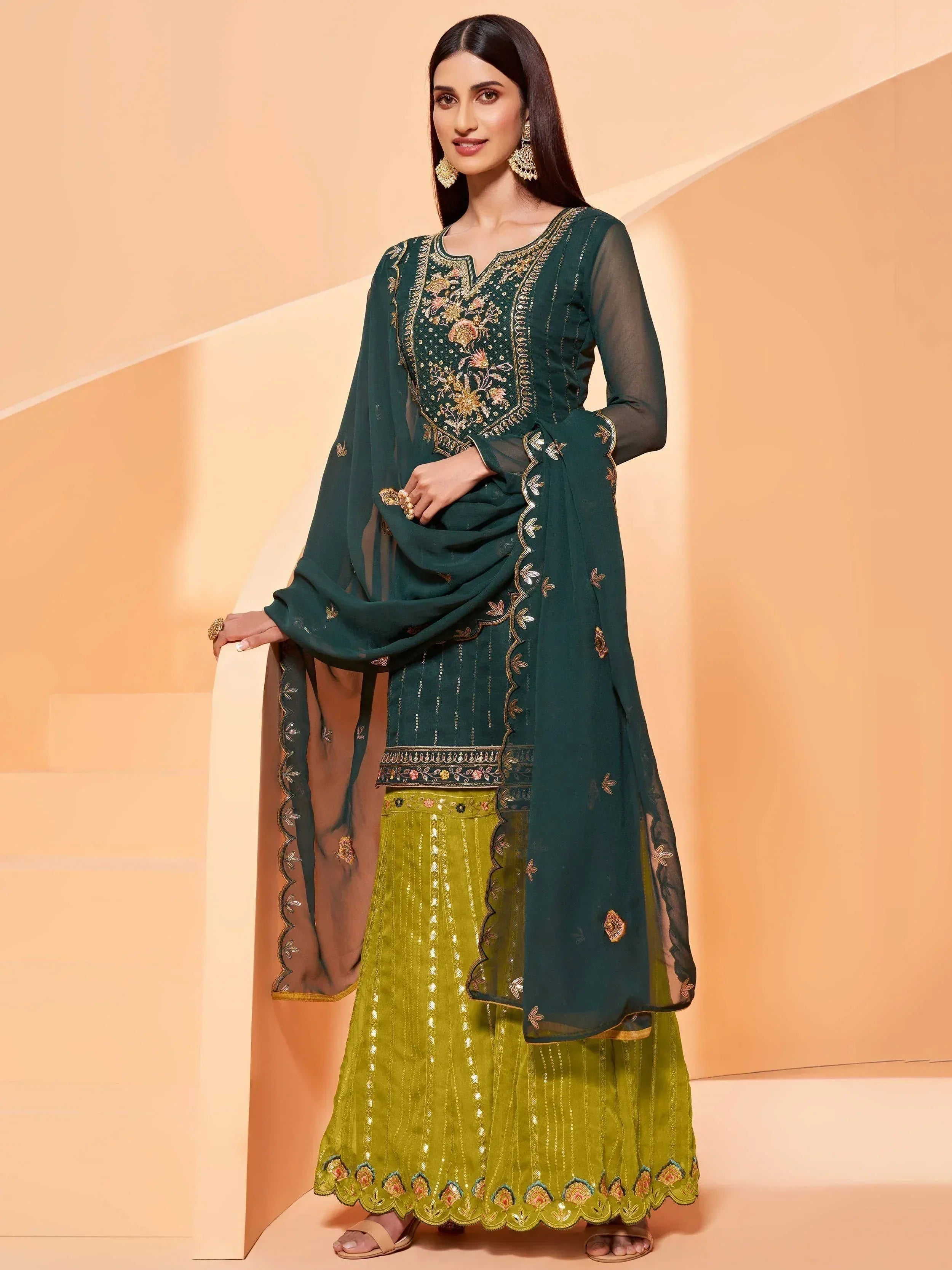 Emerald green embroidered salwar kameez with yellow skirt, perfect for Indian ethnic wear occasions