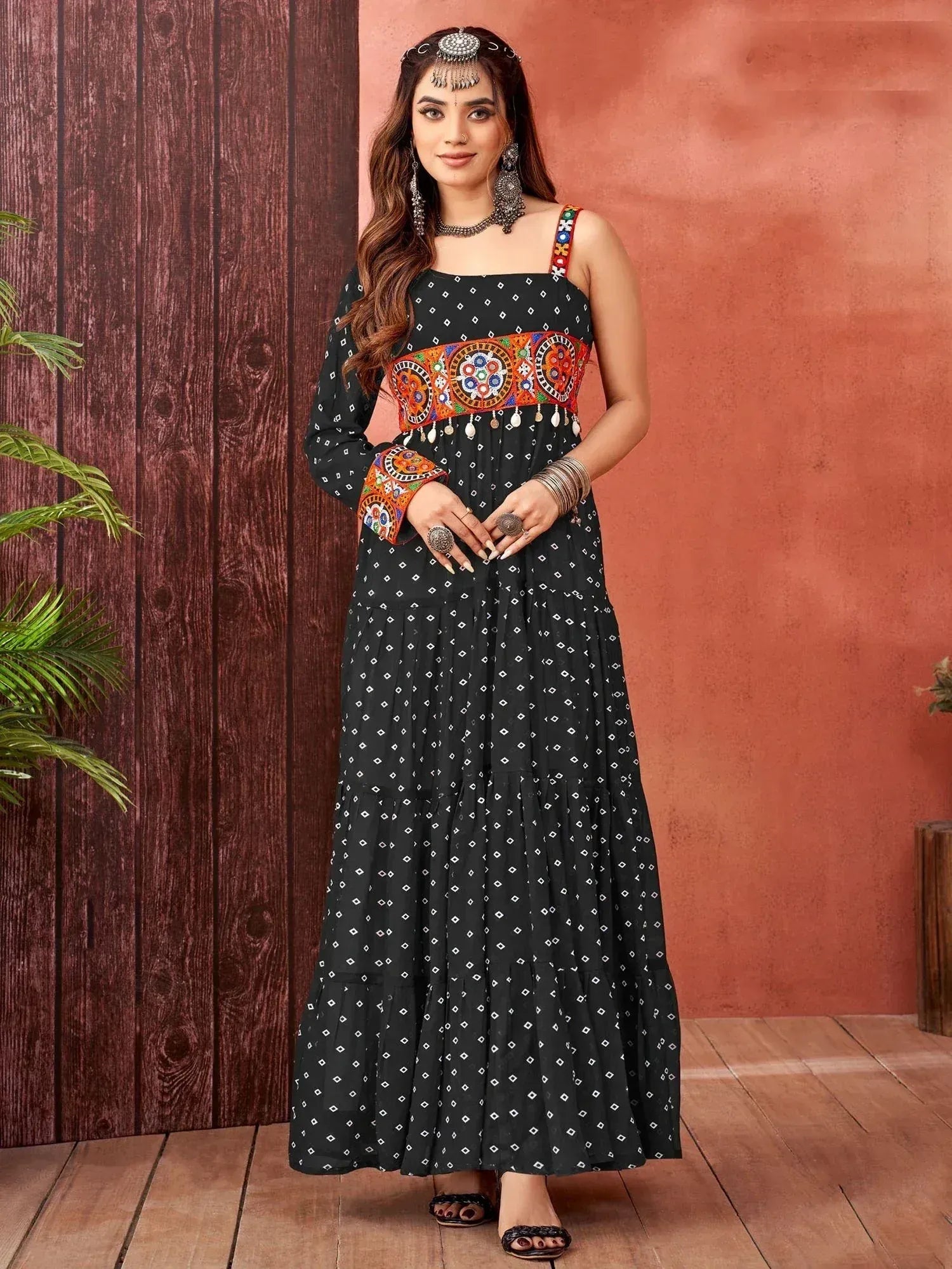 Black printed ethnic gown with colorful embroidery, perfect for Indian festive wear and occasions.