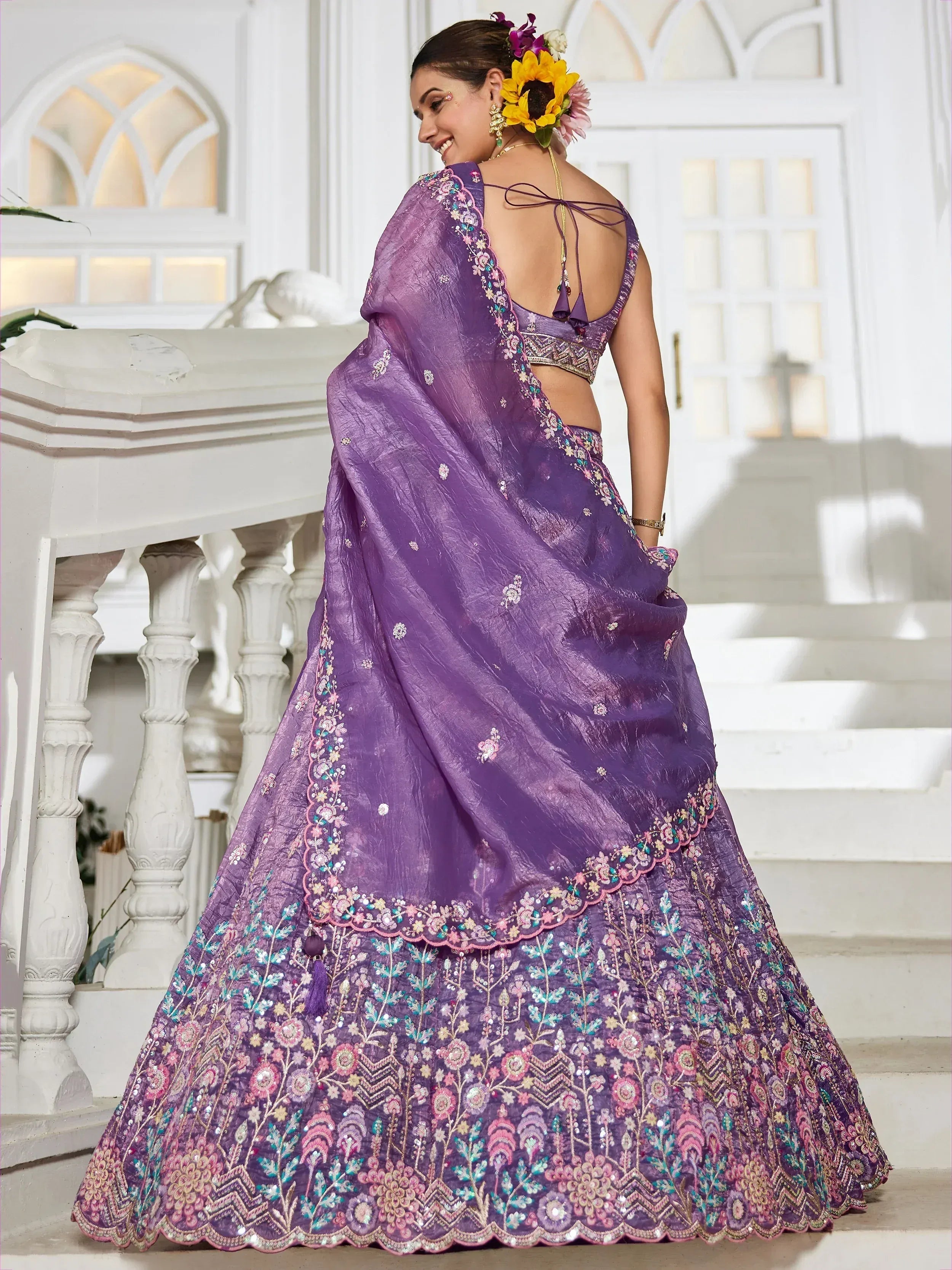 Purple embroidered lehenga choli with floral detailing, perfect for Indian ethnic occasions