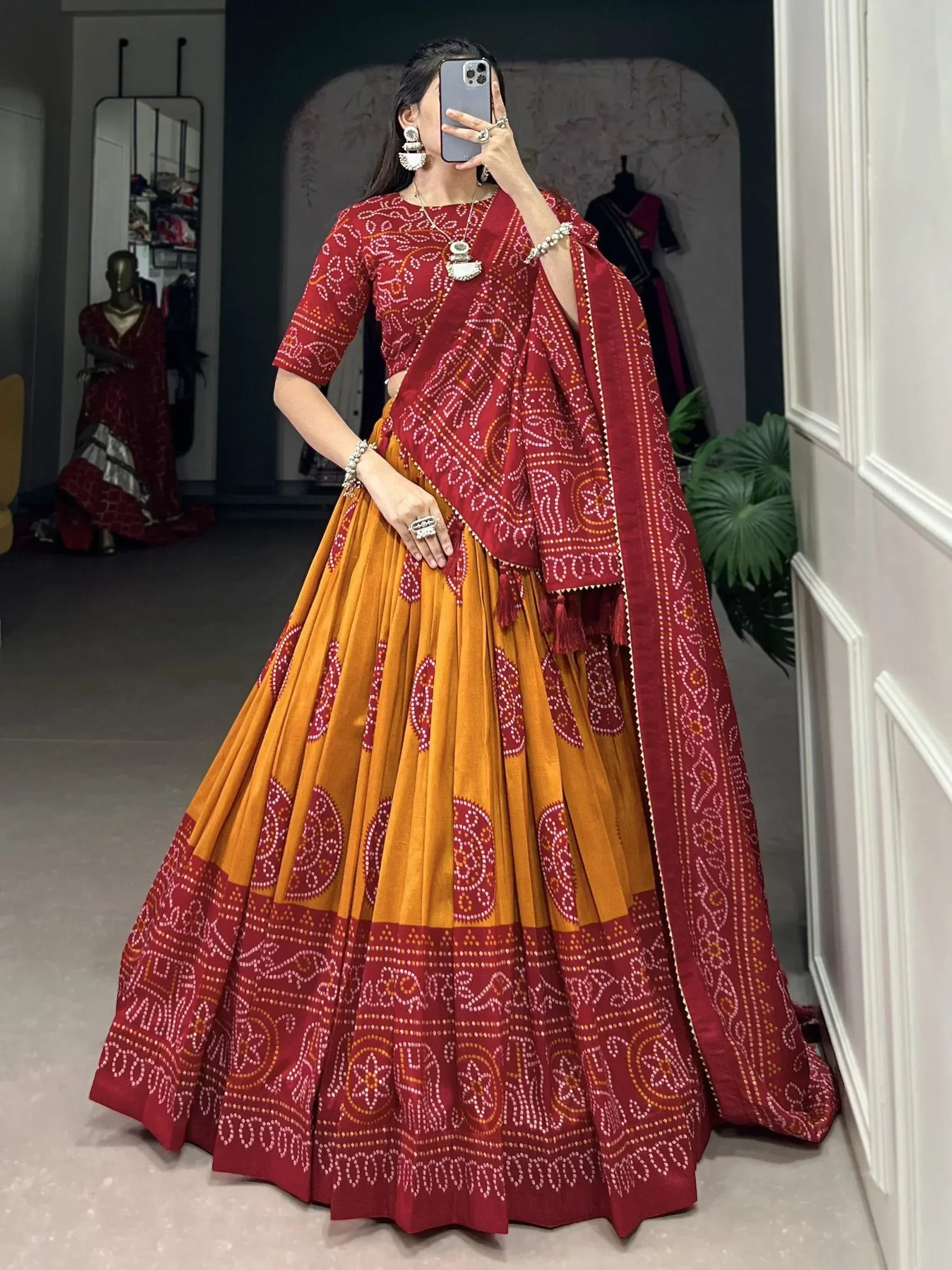 Red and mustard Bandhani print lehenga choli with dupatta, ethnic Indian wear for festive occasions