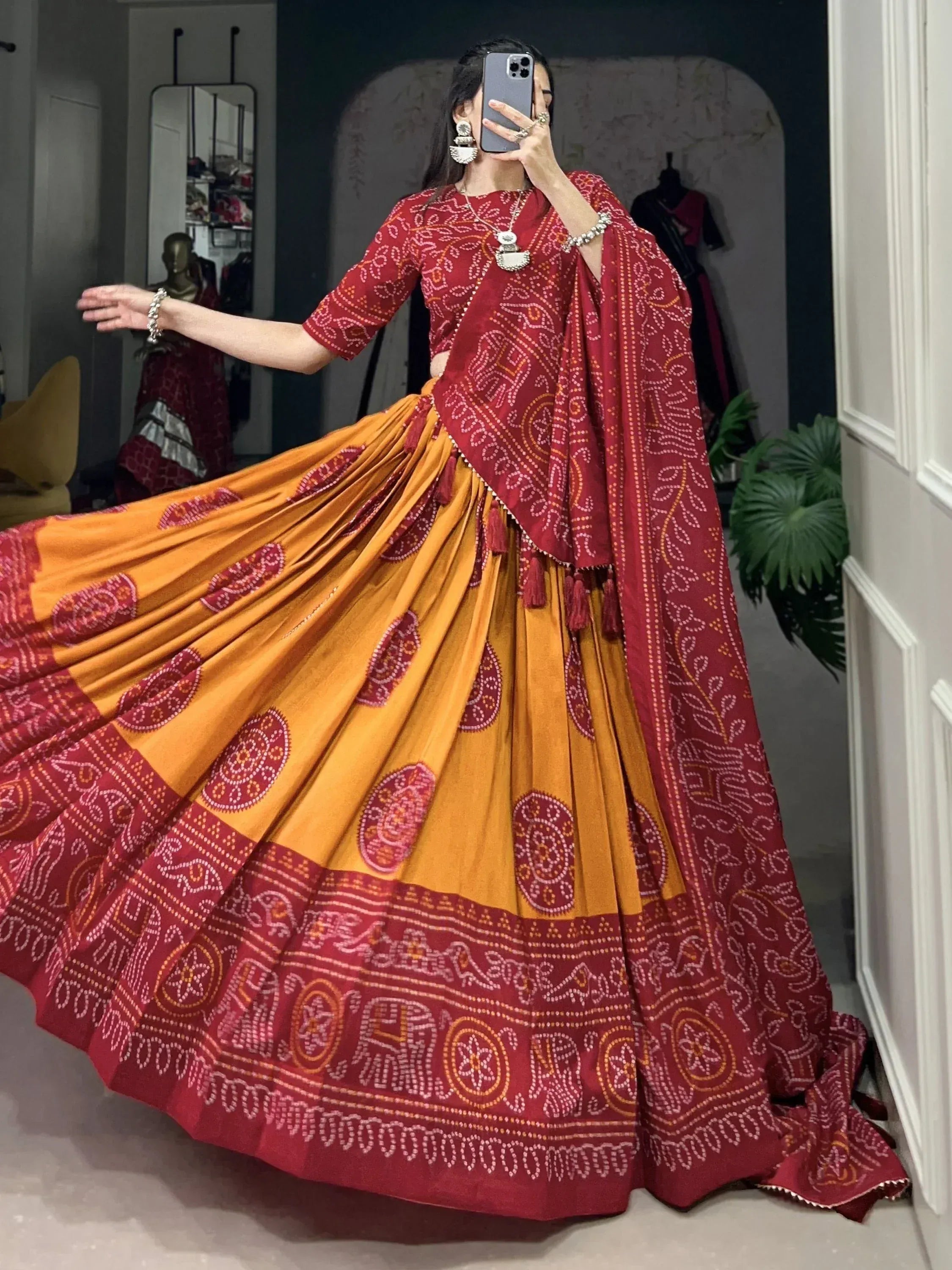 Red and mustard Bandhani print lehenga choli with dupatta, ethnic Indian wear for festive occasions