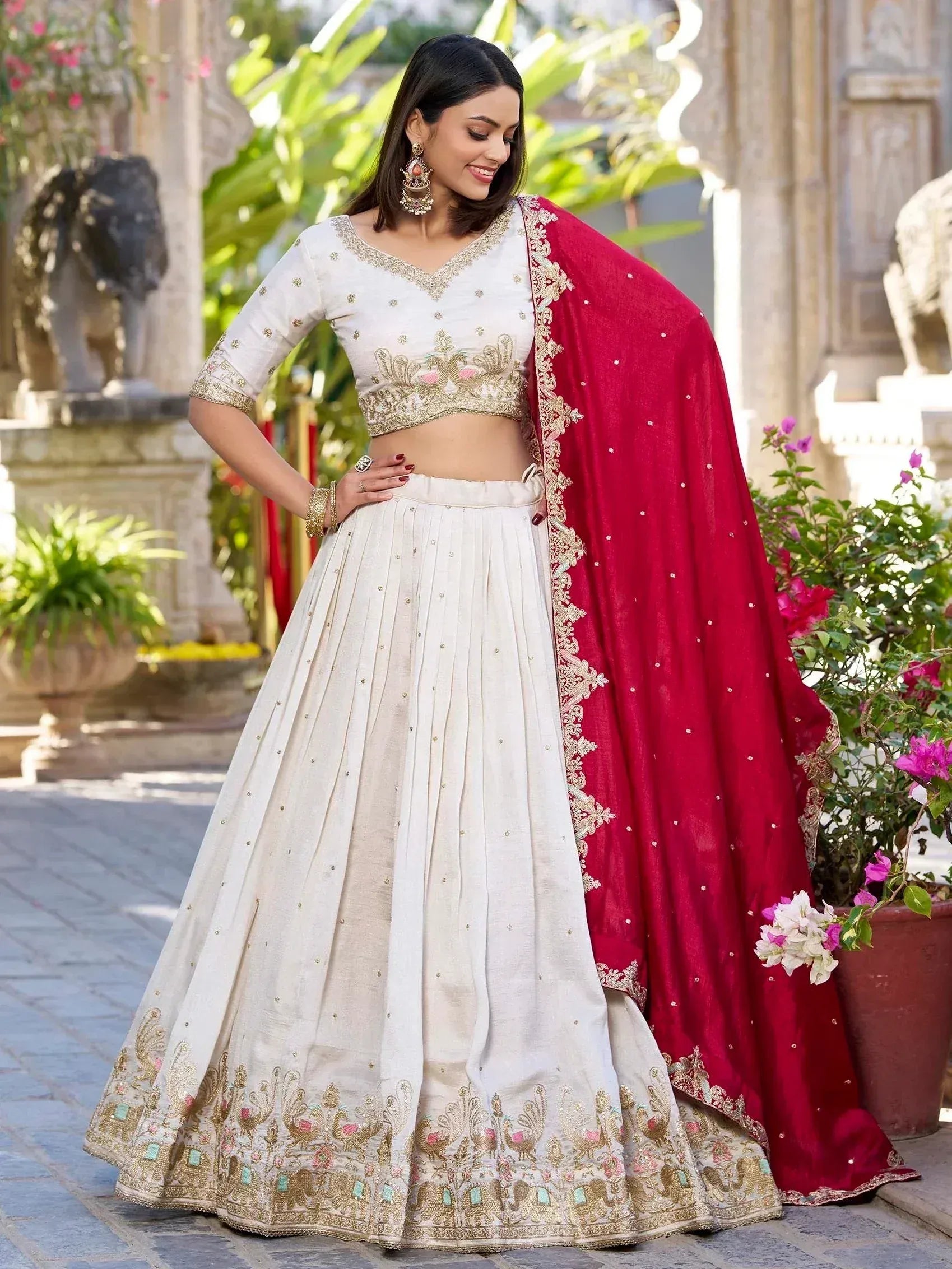 White embroidered lehenga choli with red dupatta, Indian ethnic wear for weddings and festivals