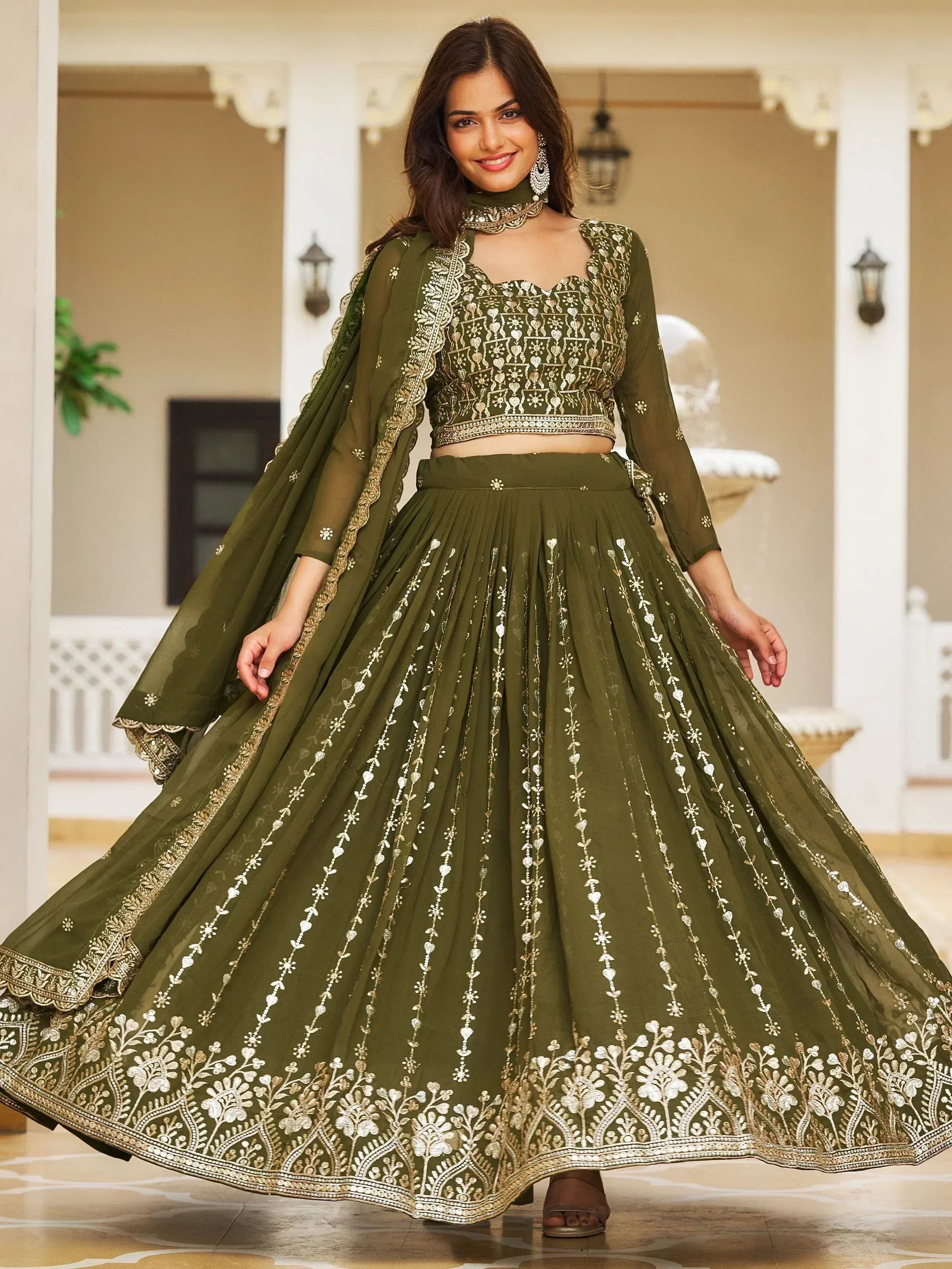 Olive green embroidered lehenga choli with gold detailing, perfect for Indian ethnic occasions