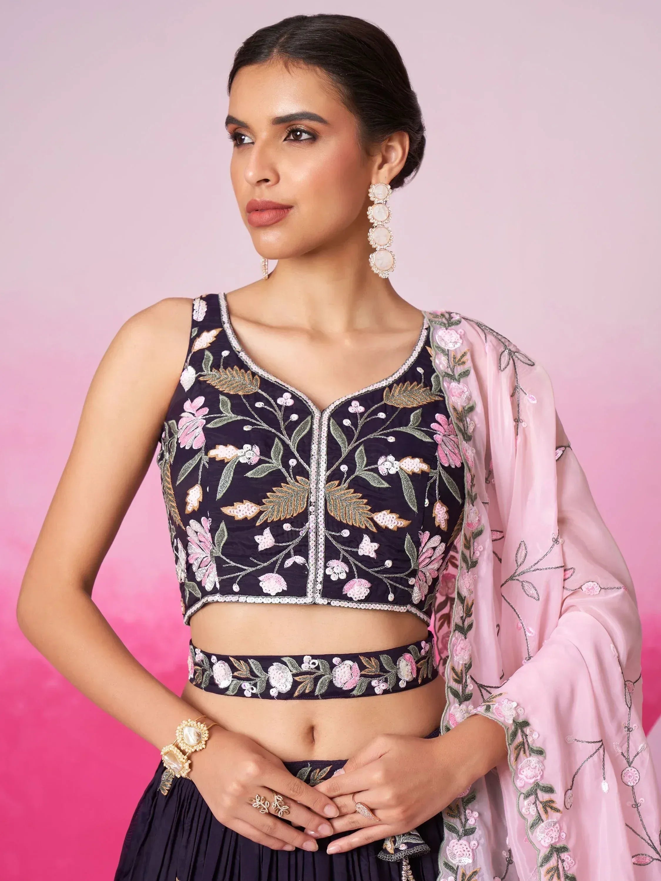 Navy blue embroidered lehenga choli with pink floral dupatta, perfect for Indian ethnic wear occasions.