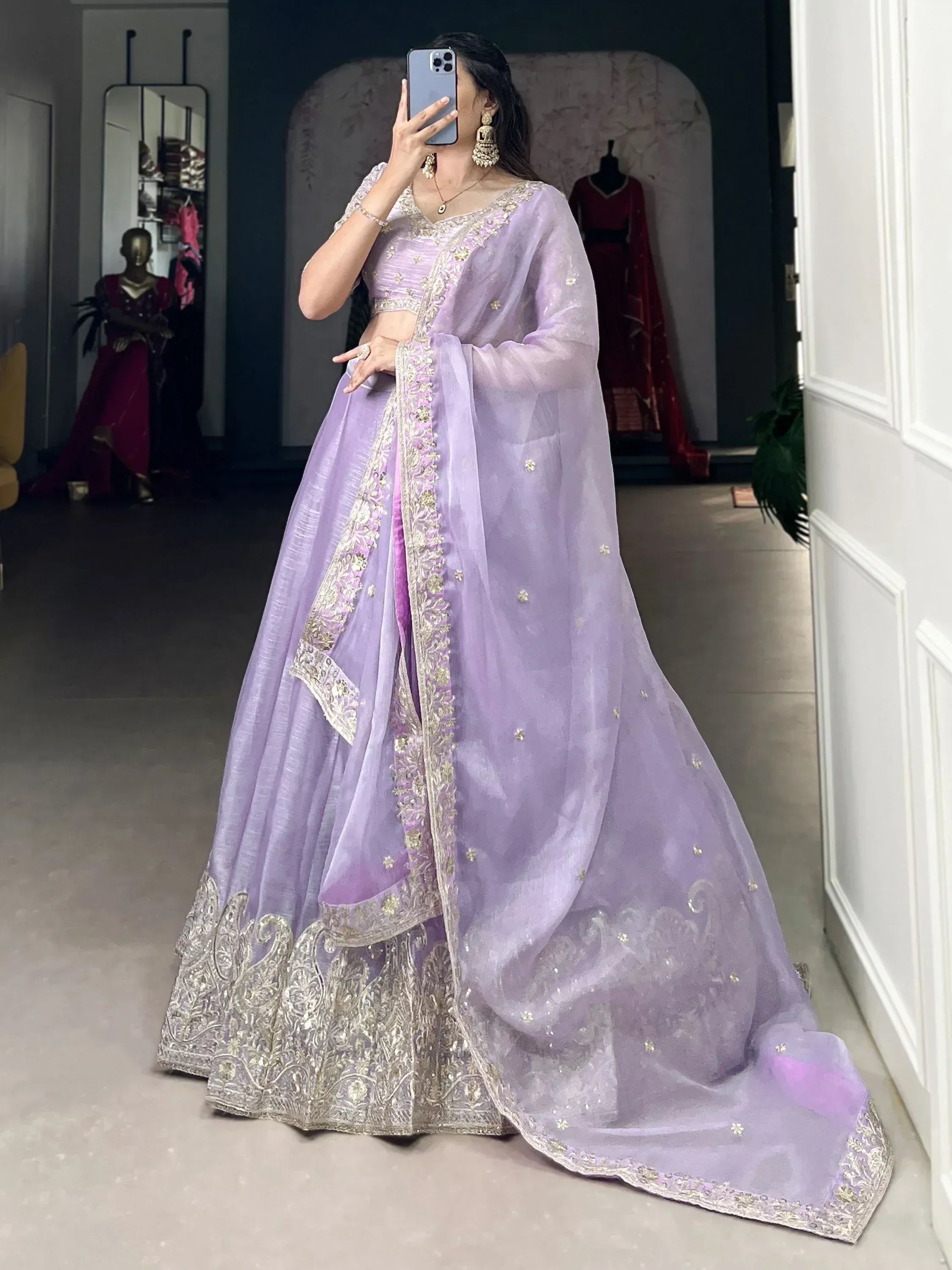 Lavender designer lehenga choli with gold embroidery, perfect for Indian ethnic wear and festive occasions.