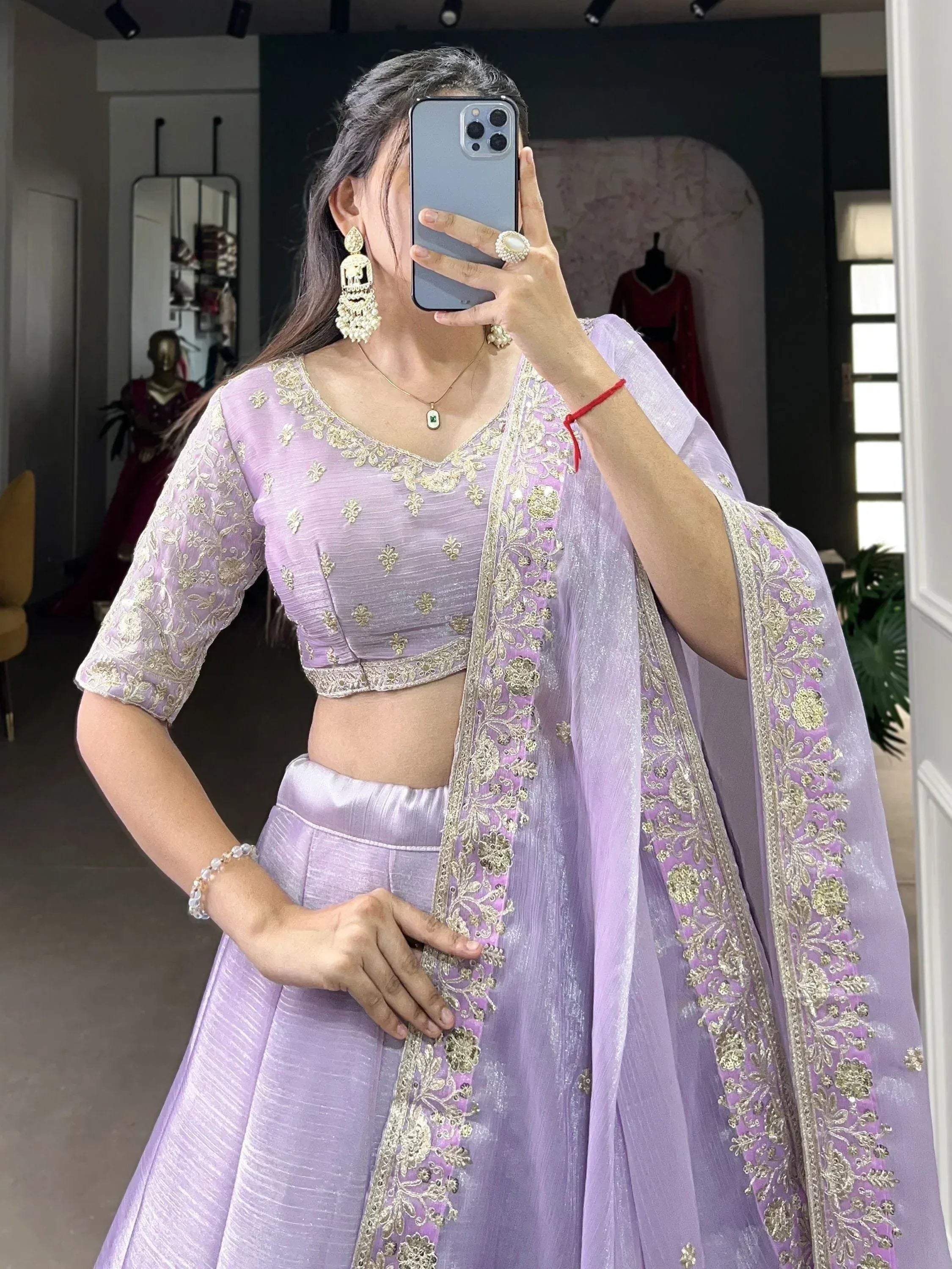 Lavender designer lehenga choli with gold embroidery, perfect for Indian ethnic wear occasions.