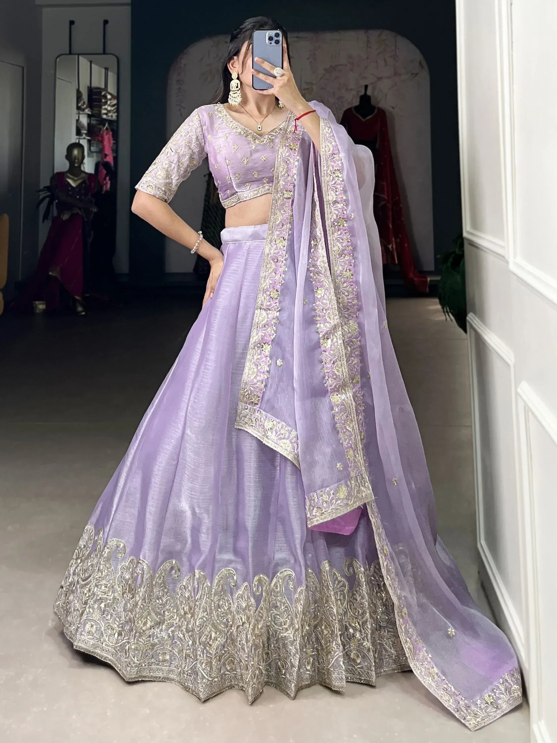Lavender designer lehenga choli with gold embroidery, perfect for Indian weddings and festive occasions.