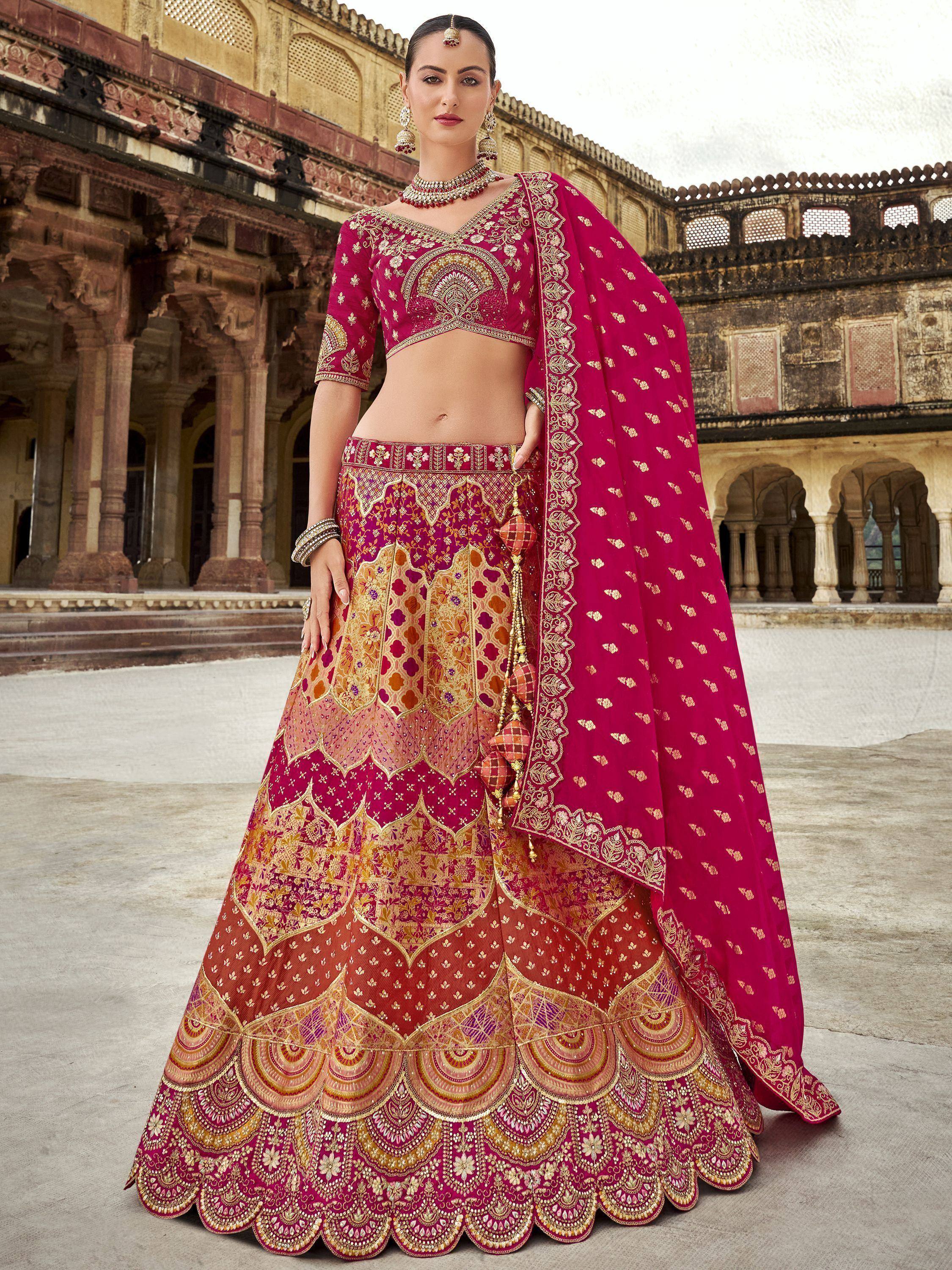 Elegant maroon lehenga choli with gold embroidery, perfect for Indian weddings and festive occasions.