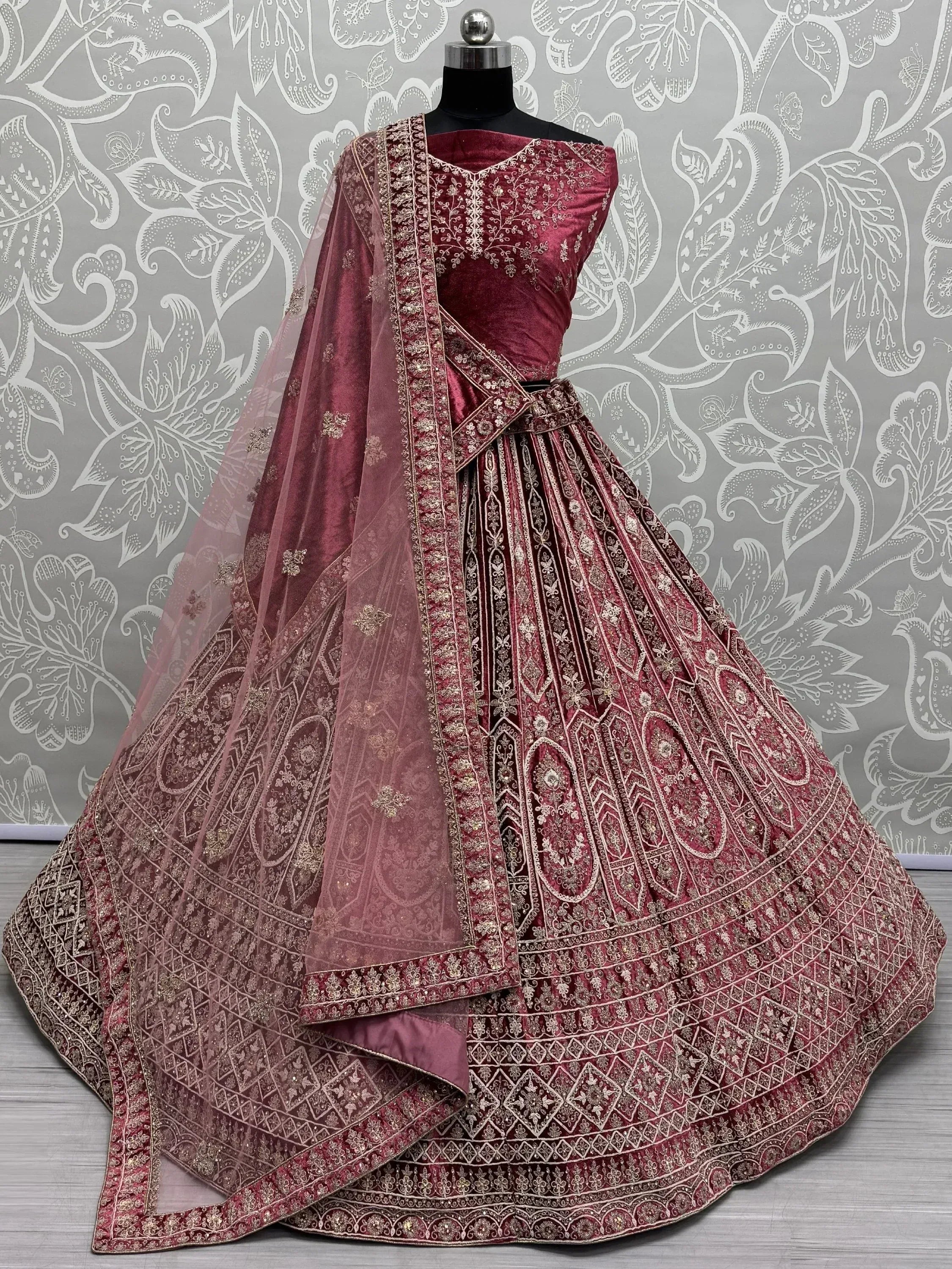 Burgundy velvet lehenga choli with gold embroidery and sheer dupatta, Indian ethnic wear