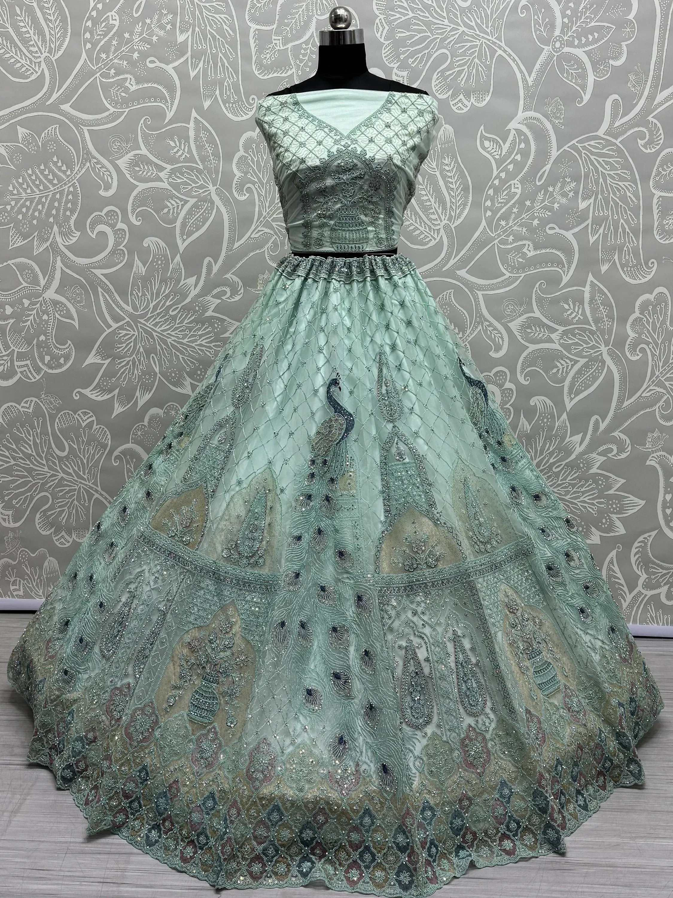 Mint green designer lehenga choli with peacock embroidery and sequin work, ethnic Indian wear