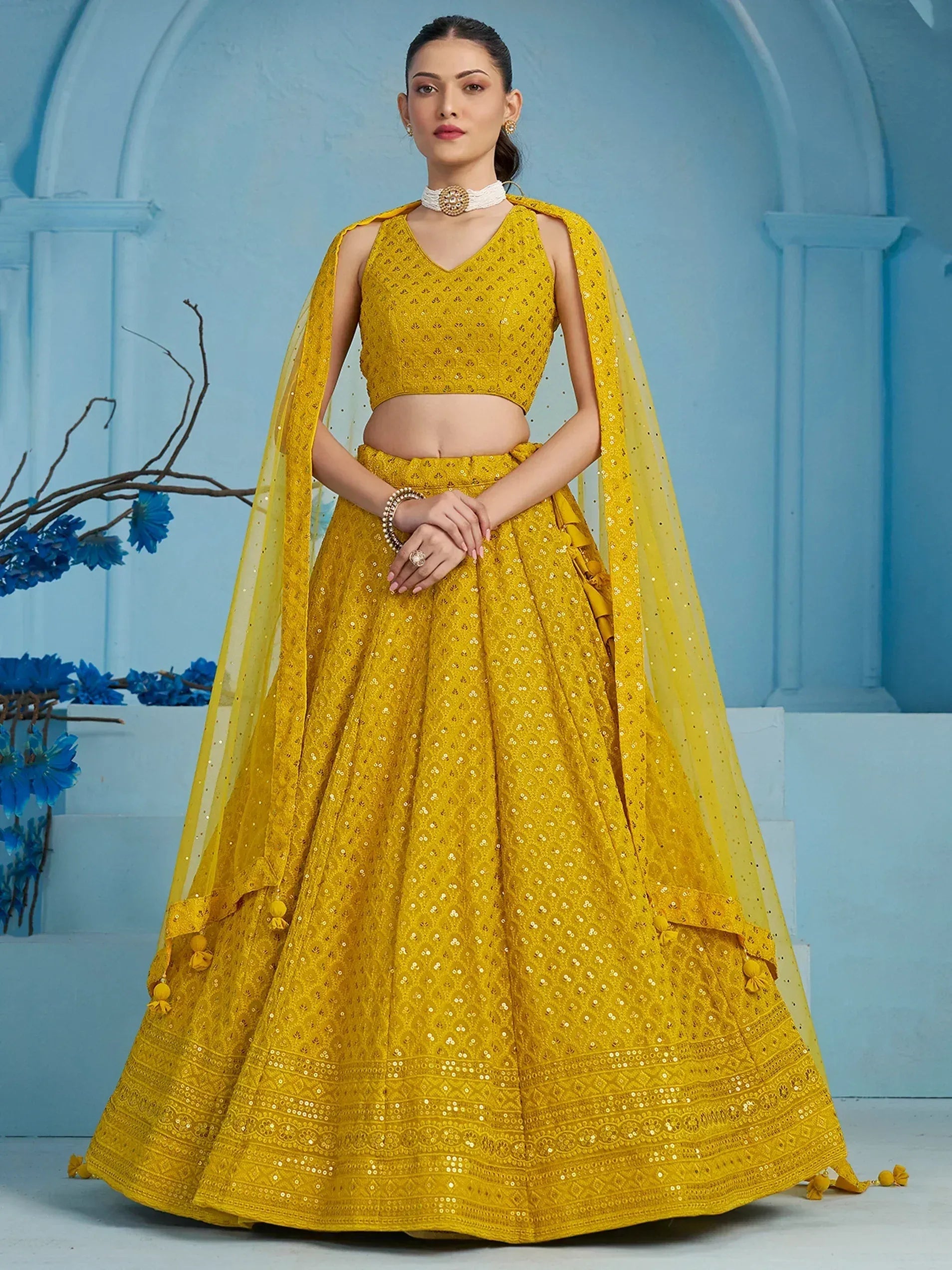 Yellow designer lehenga choli with sequin work and dupatta, perfect for Indian ethnic occasions