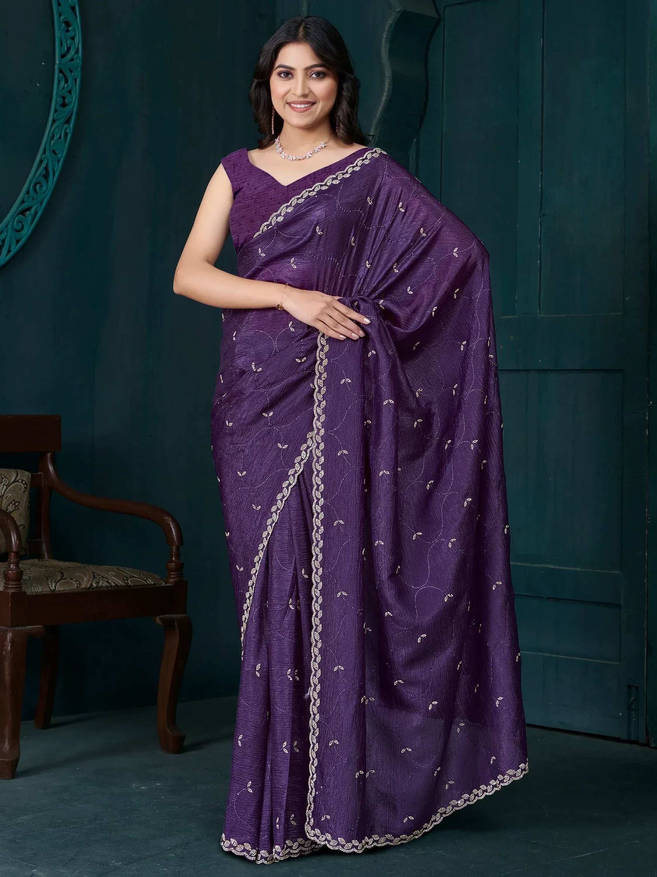 Purple embroidered saree with gold detailing, stylish Indian ethnic wear for women