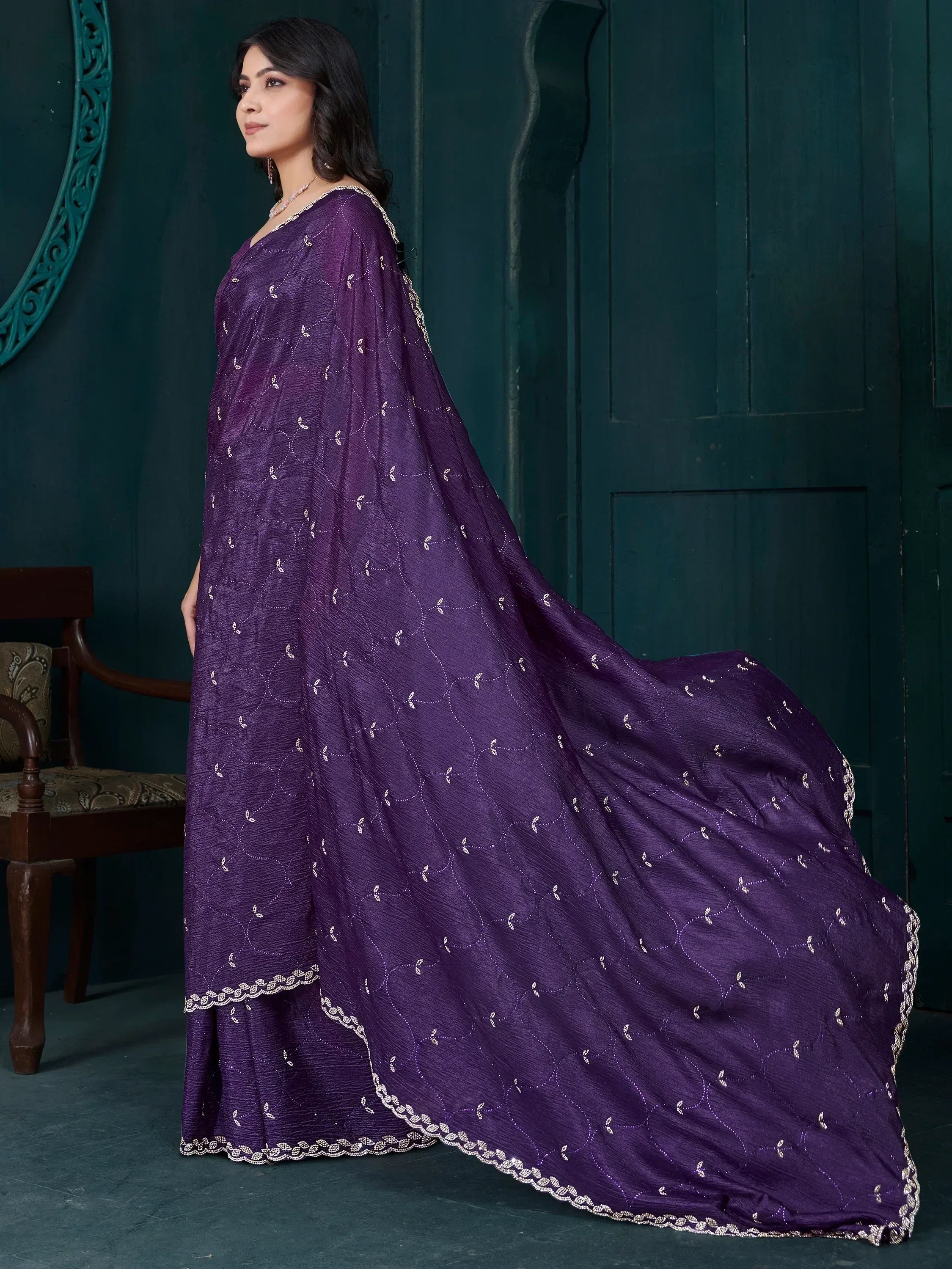 Purple ethnic gown with gold embroidery, perfect for Indian occasions and festive wear.