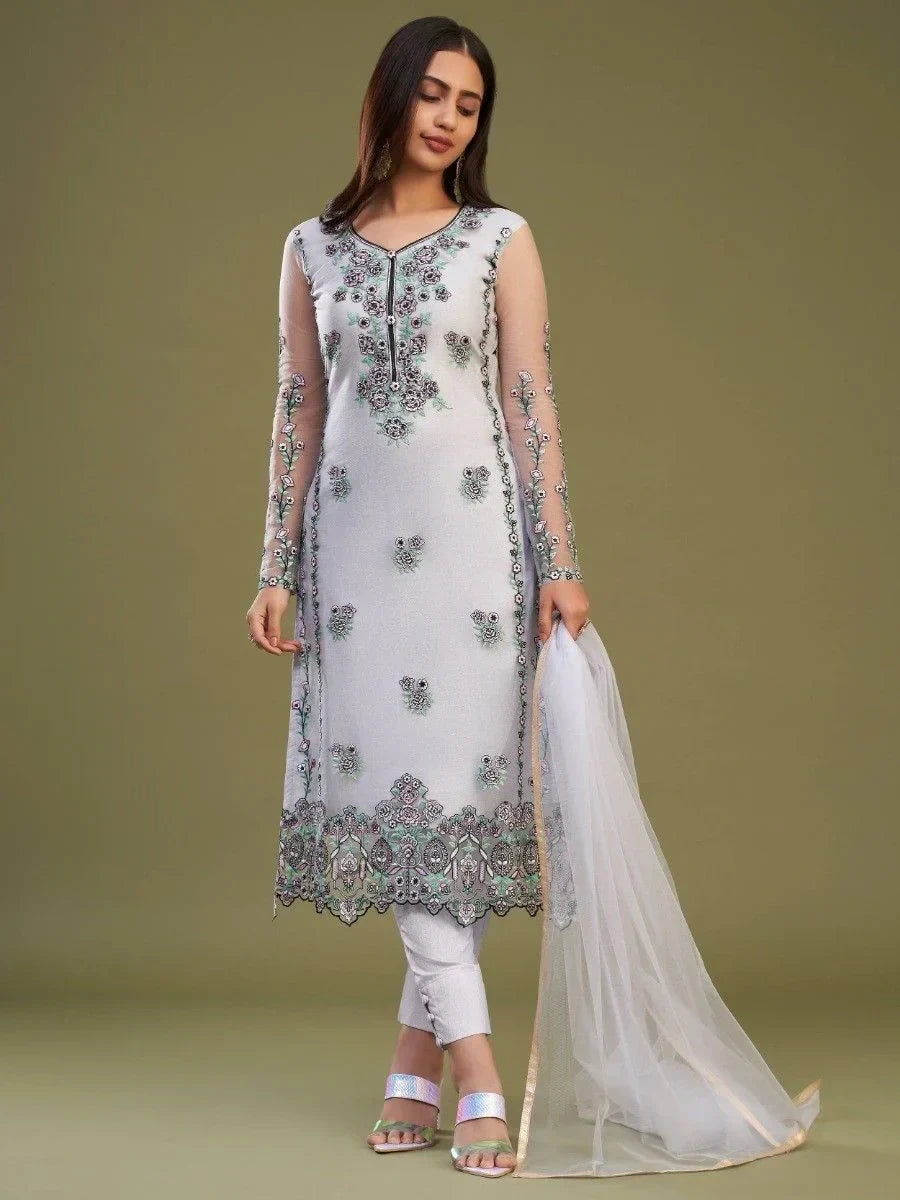 Woman wearing light grey embroidered salwar kameez with dupatta, Indian ethnic wear