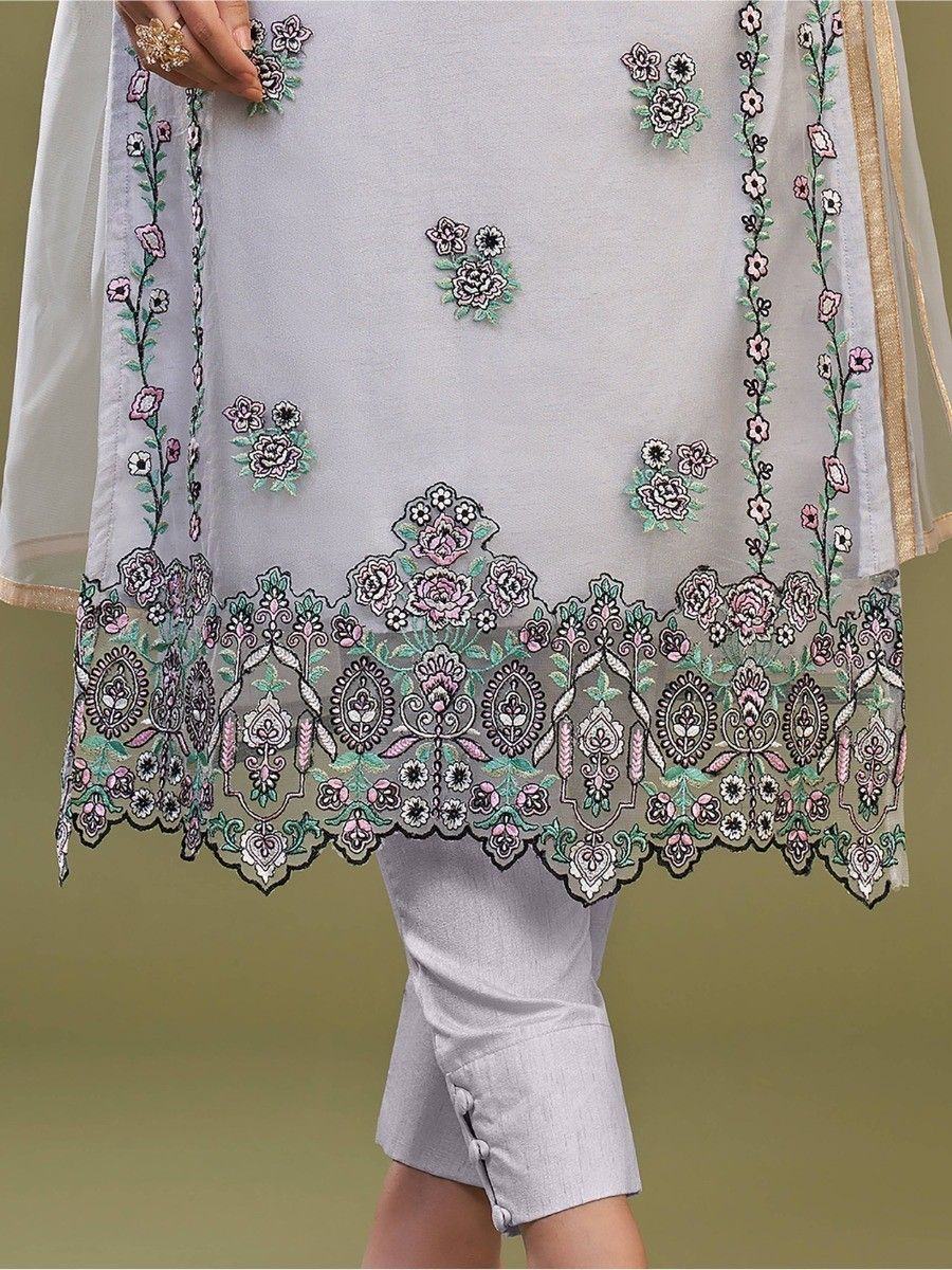 Light grey ethnic kurta with floral embroidery, paired with straight pants, front close-up