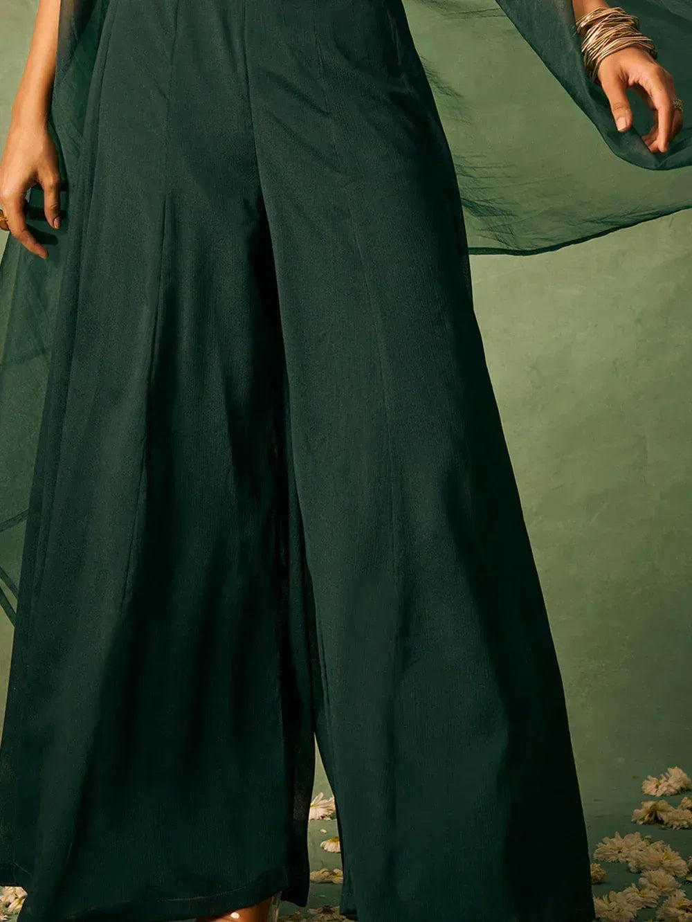 Dark green wide-leg palazzo pants with sheer dupatta, styled for ethnic wear