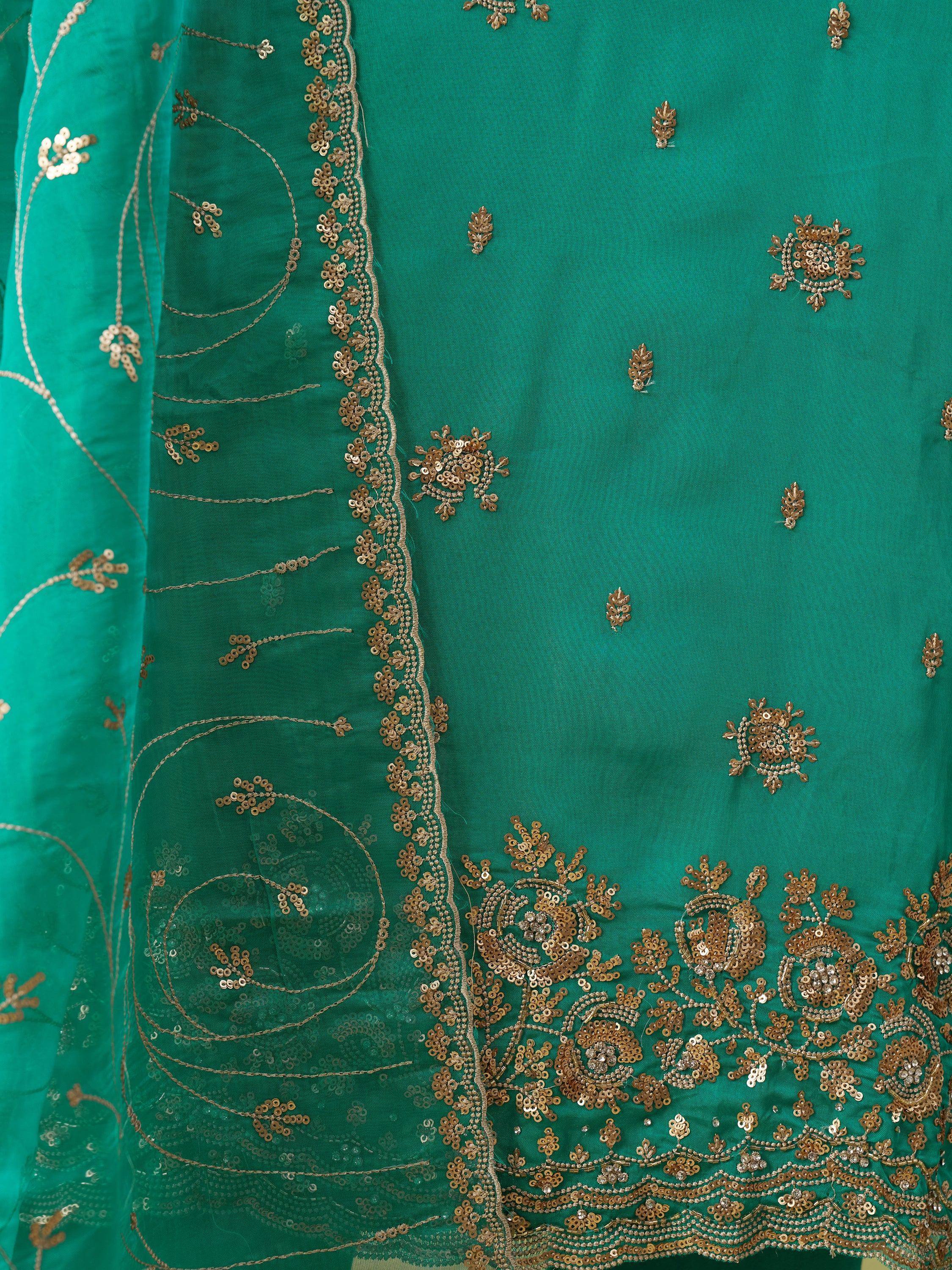 Emerald green ethnic wear with gold sequin embroidery and floral patterns