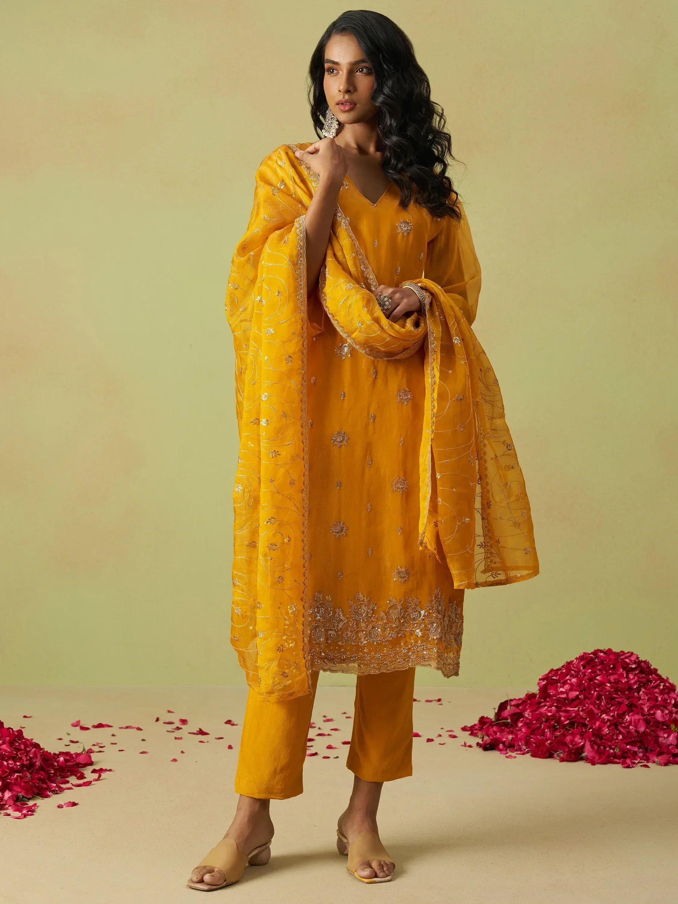 Yellow embroidered salwar kameez with matching dupatta, perfect for ethnic occasions and festive wear.