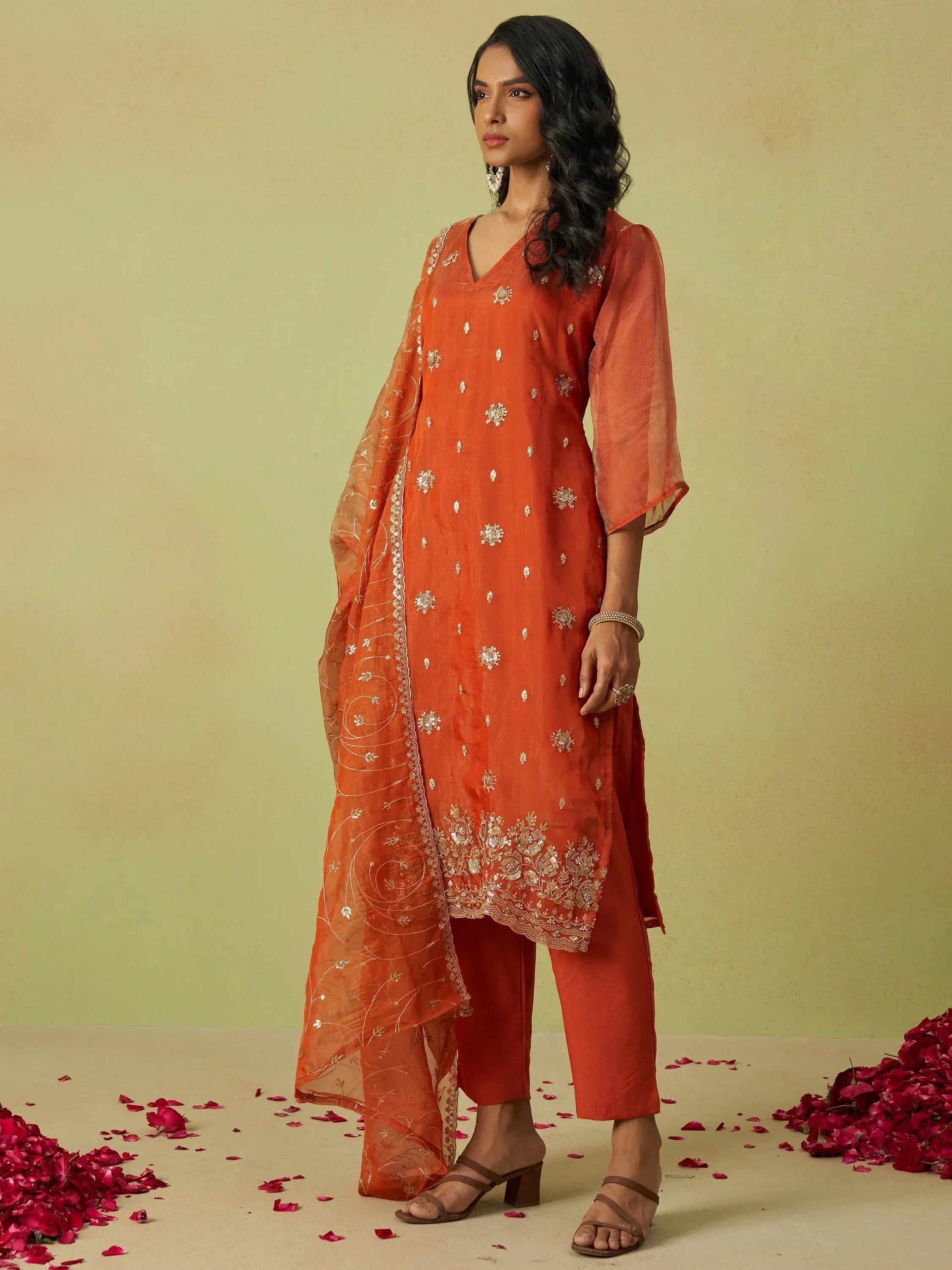 Orange embroidered salwar kameez with matching dupatta, ideal for festive occasions and ethnic events.
