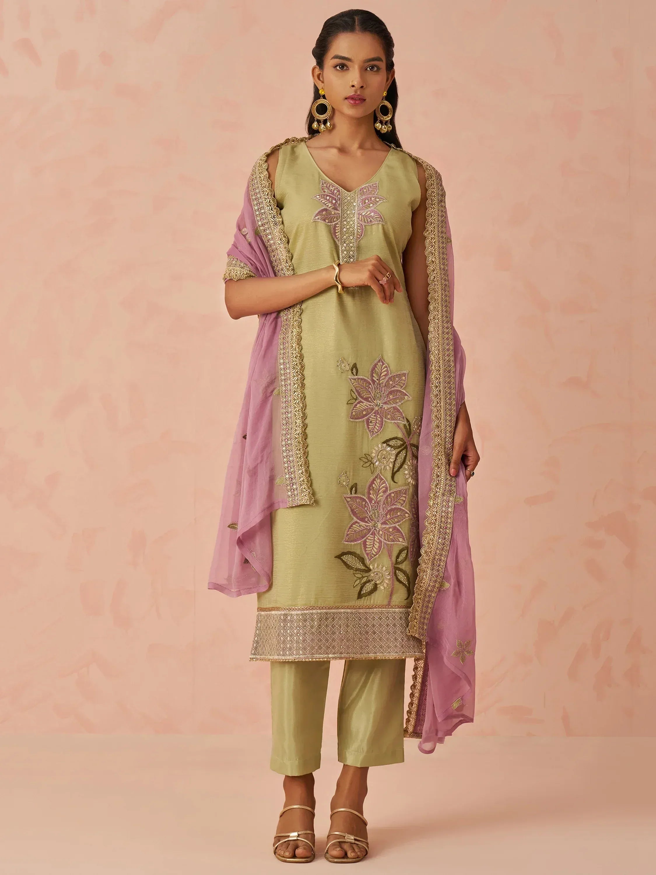 Elegant green embroidered salwar kameez with pink dupatta, perfect for Indian ethnic wear