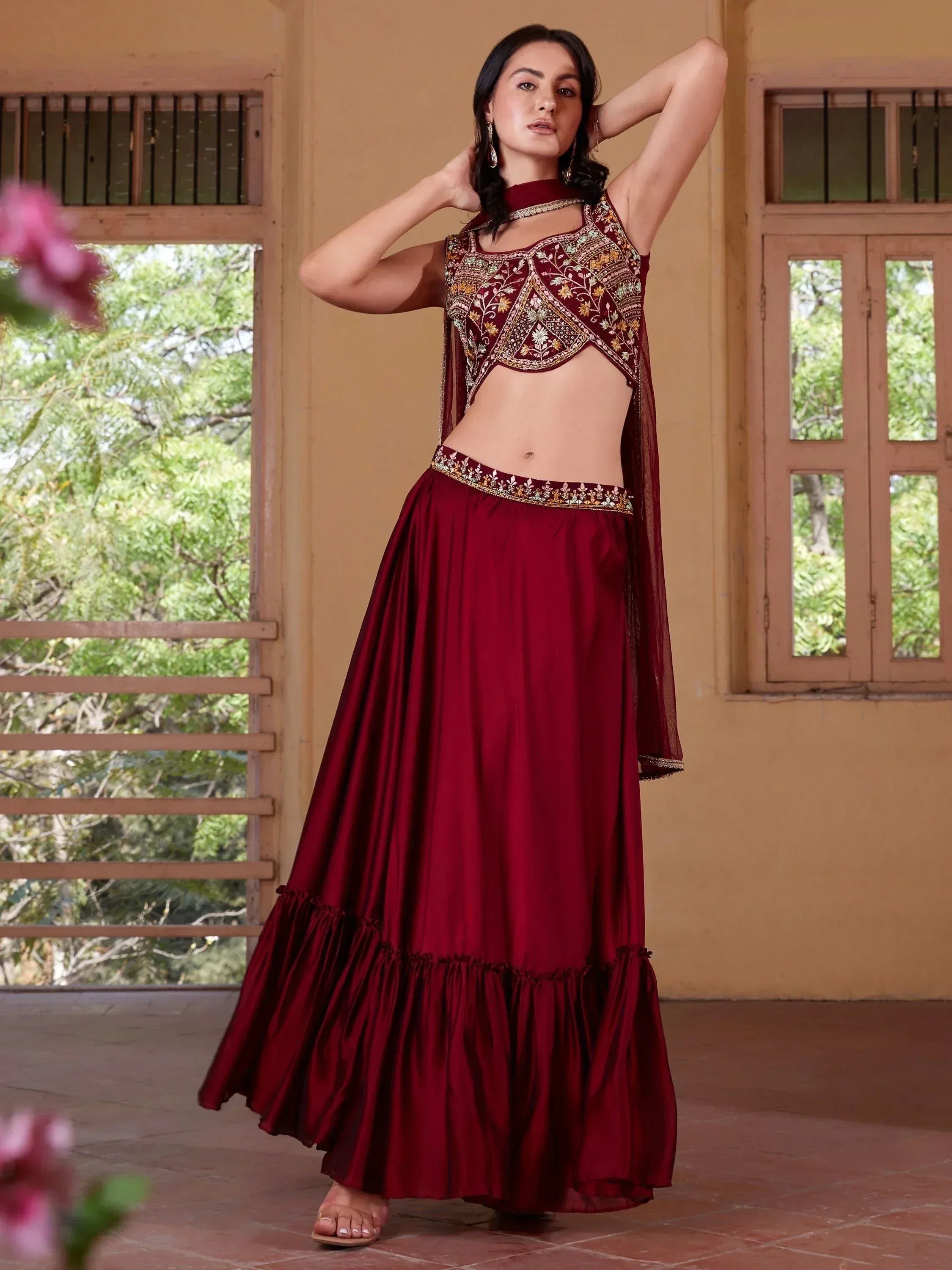 Maroon embroidered lehenga choli with floral detailing, perfect for Indian ethnic wear occasions