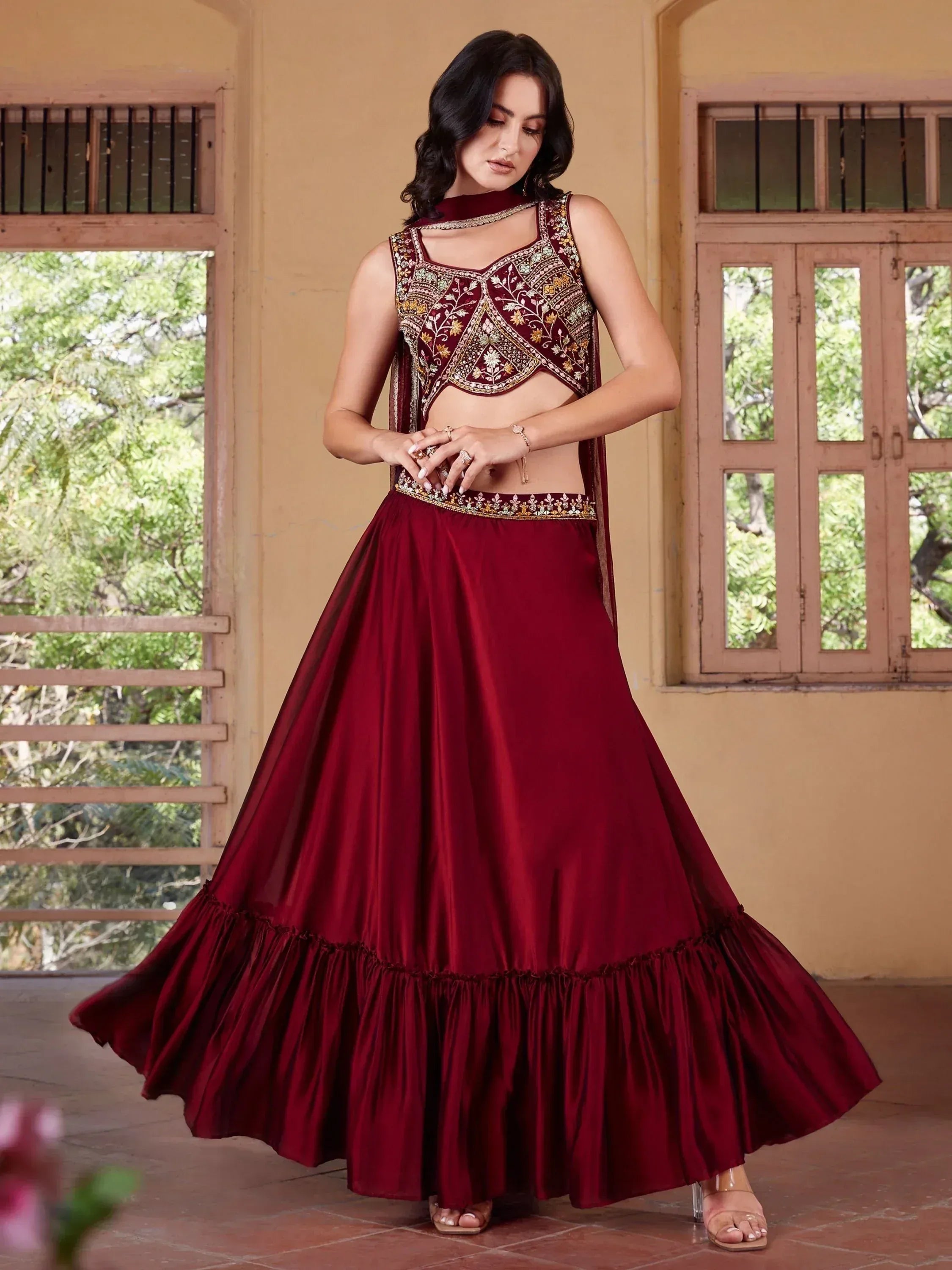 Maroon embroidered lehenga choli with floral detailing, perfect for Indian ethnic wear occasions