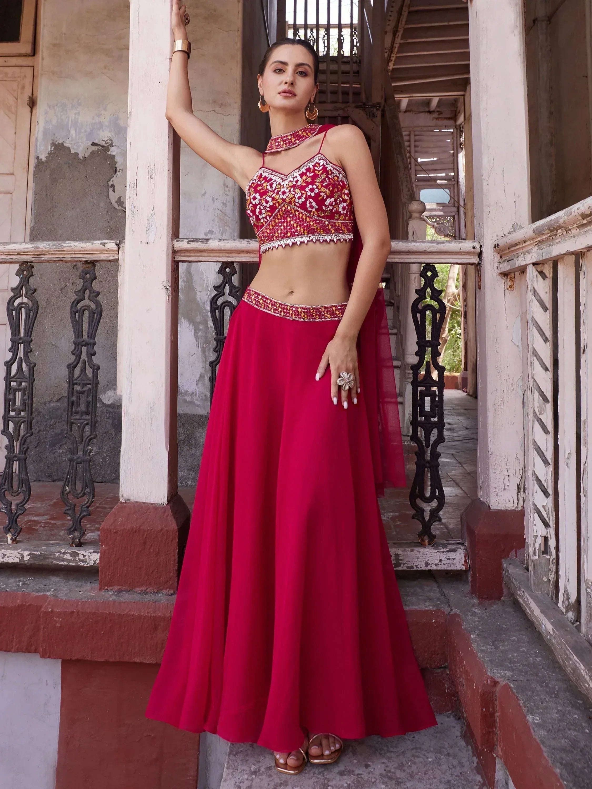 Red embroidered lehenga choli with floral blouse, perfect for Indian ethnic wear and festive occasions.