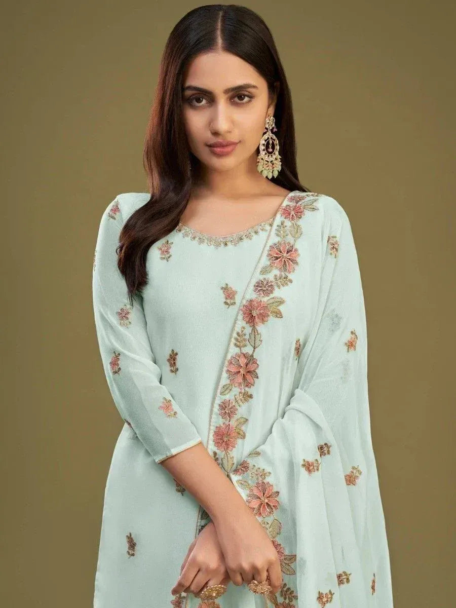 Mint green embroidered salwar kameez with floral design, perfect for Indian ethnic wear occasions