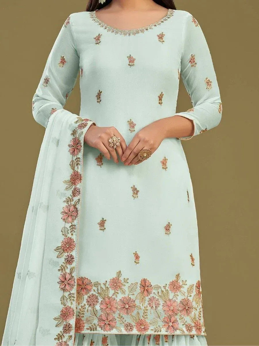 Light blue embroidered salwar kameez with floral detailing and matching dupatta, perfect for ethnic occasions