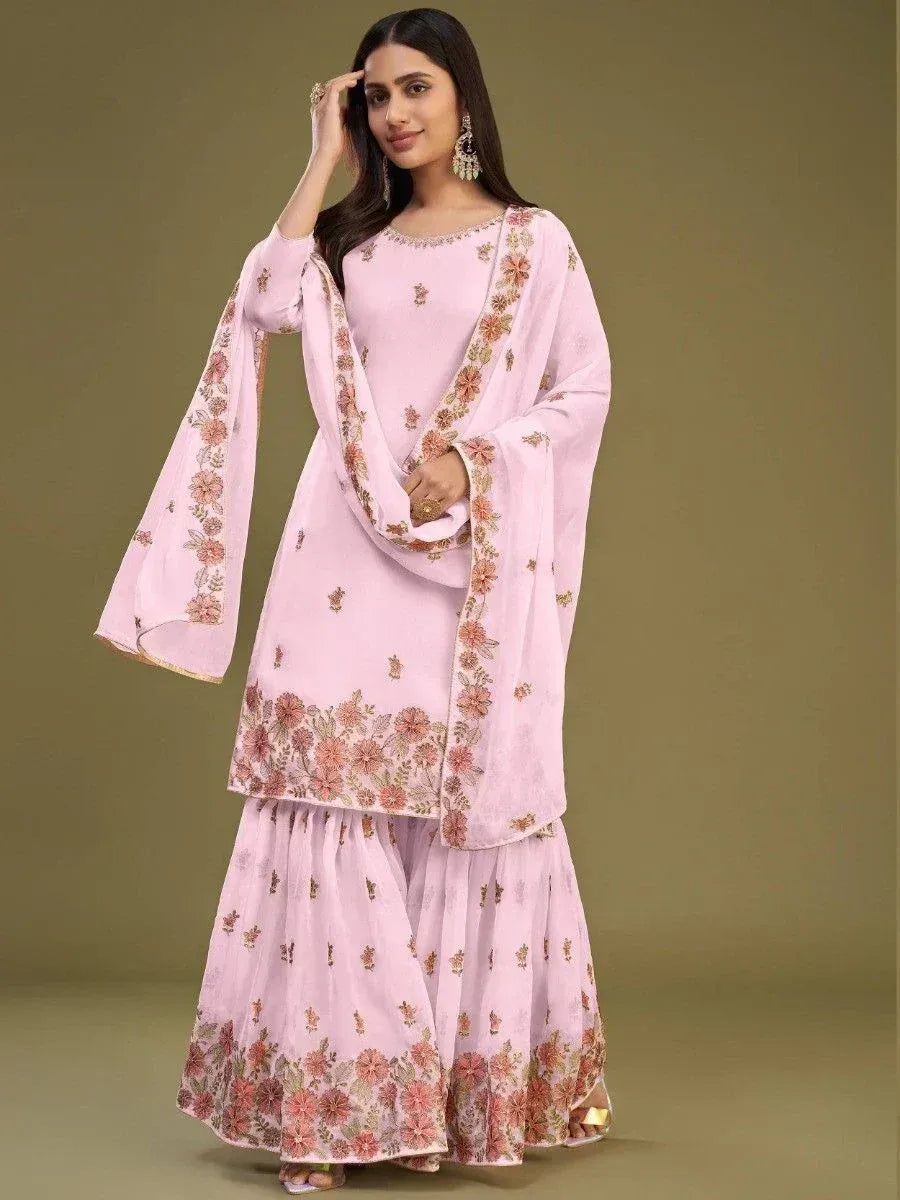 Pink floral embroidered salwar kameez with bell sleeves, perfect for Indian ethnic wear occasions