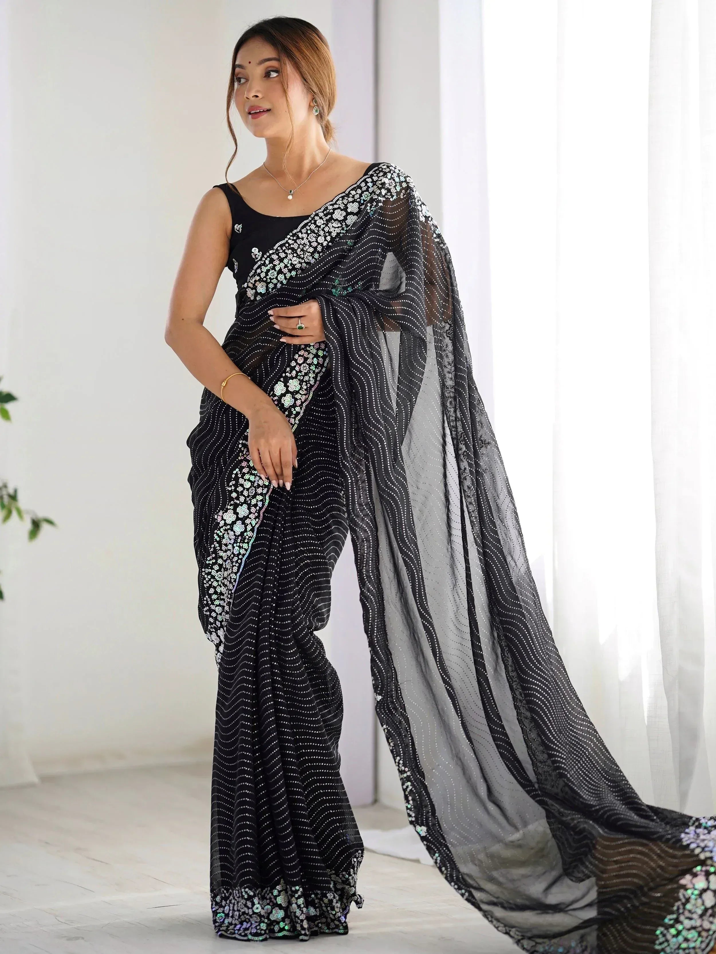 Black sequin saree with floral embroidery, stylish Indian ethnic wear for women