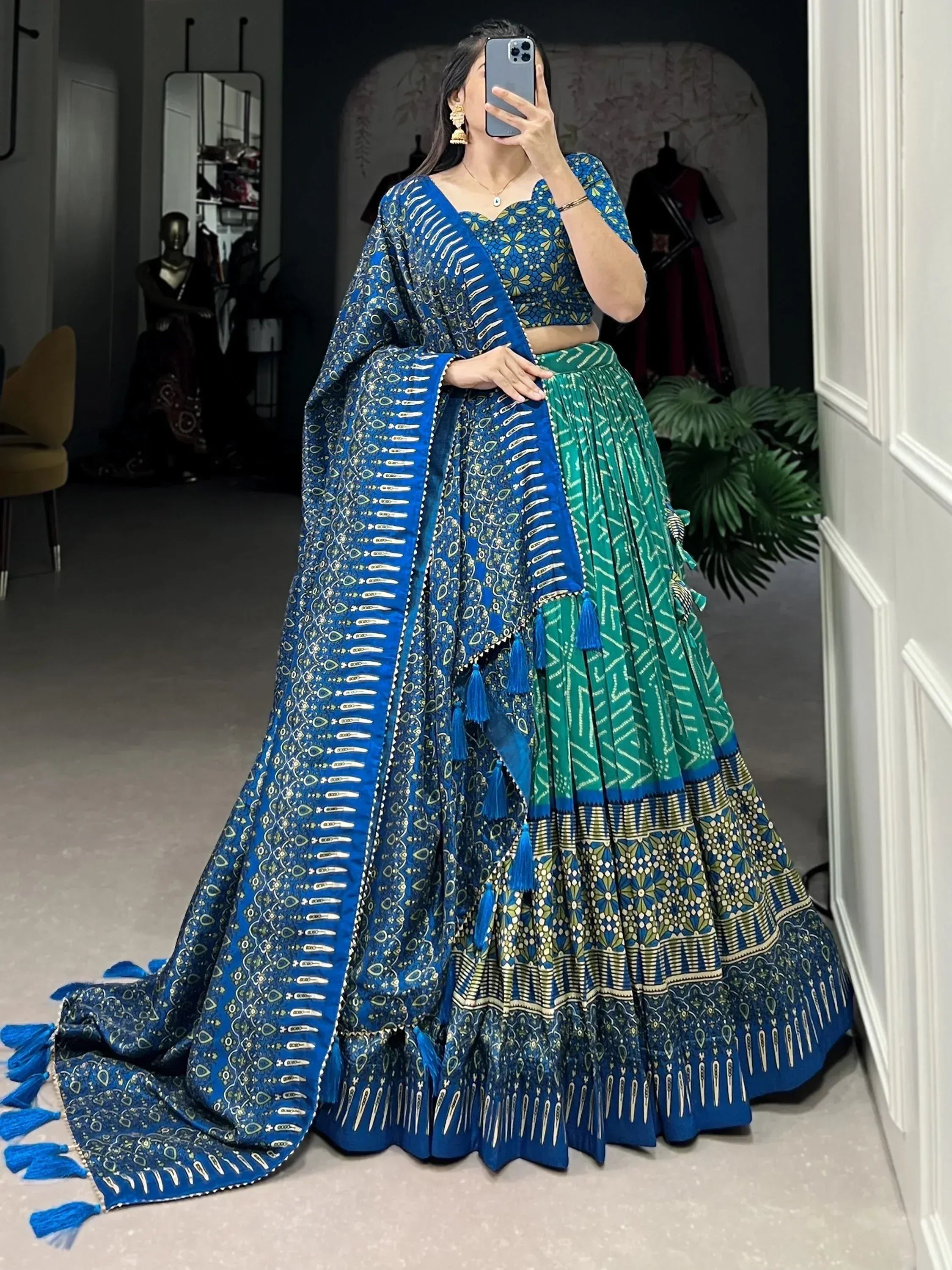 Blue and green printed lehenga choli with tassels, perfect for Indian ethnic wear occasions