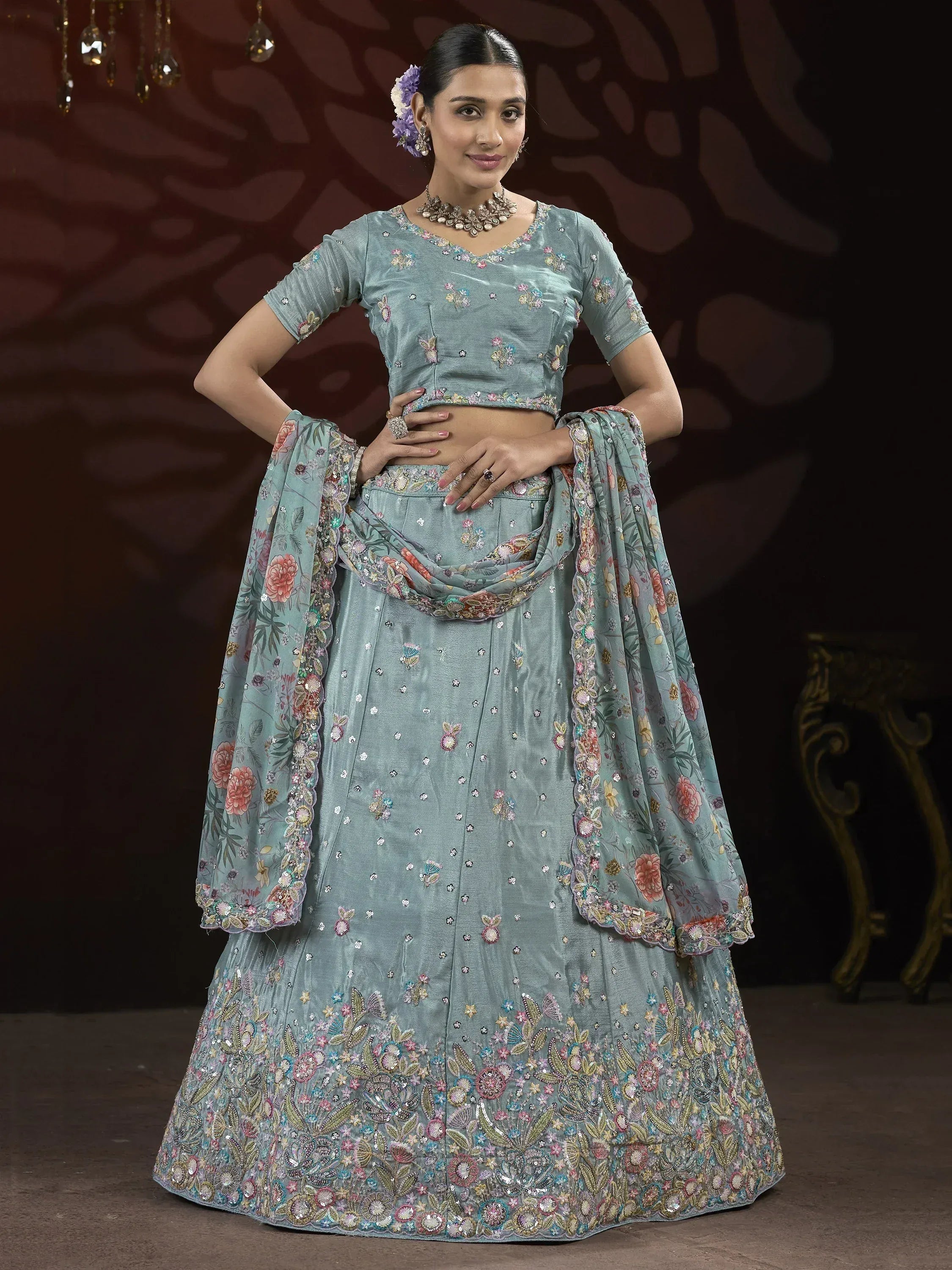 Elegant light blue lehenga choli with floral embroidery and matching dupatta for Indian ethnic wear