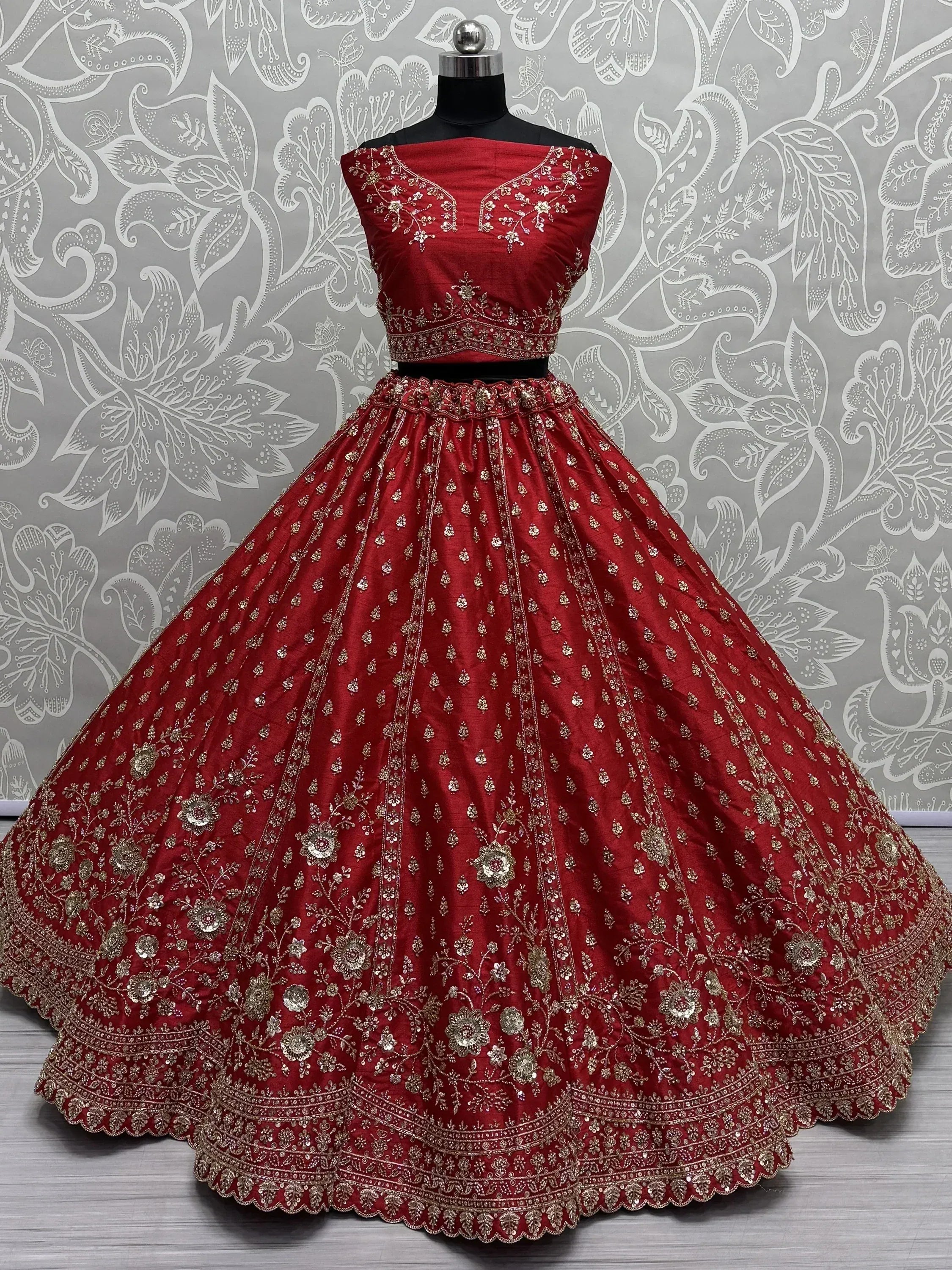 Red designer lehenga choli with gold embroidery, ethnic Indian wear for weddings and festivals