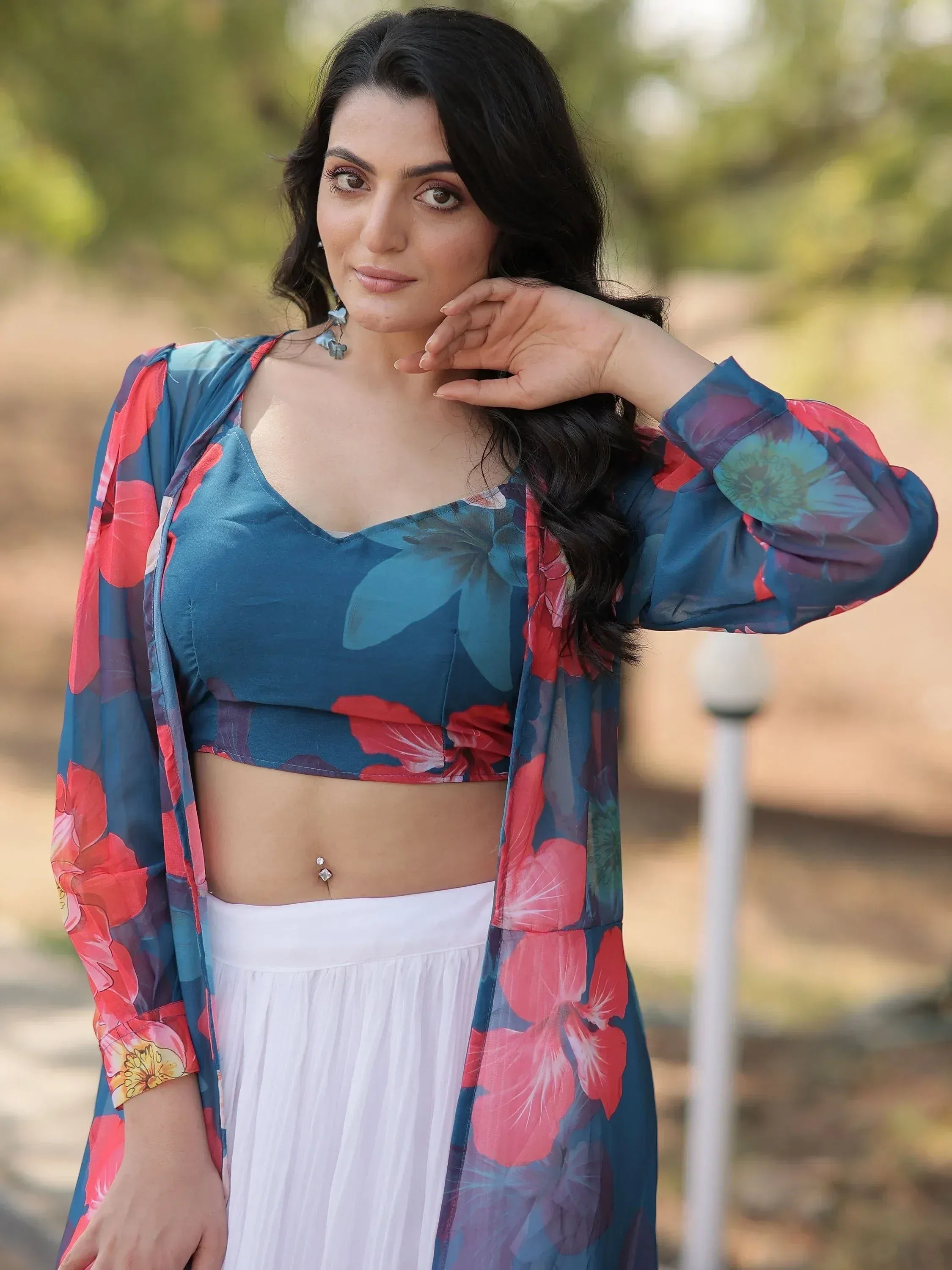 Floral print ethnic crop top with white pleated skirt, perfect for Indian fashion lovers
