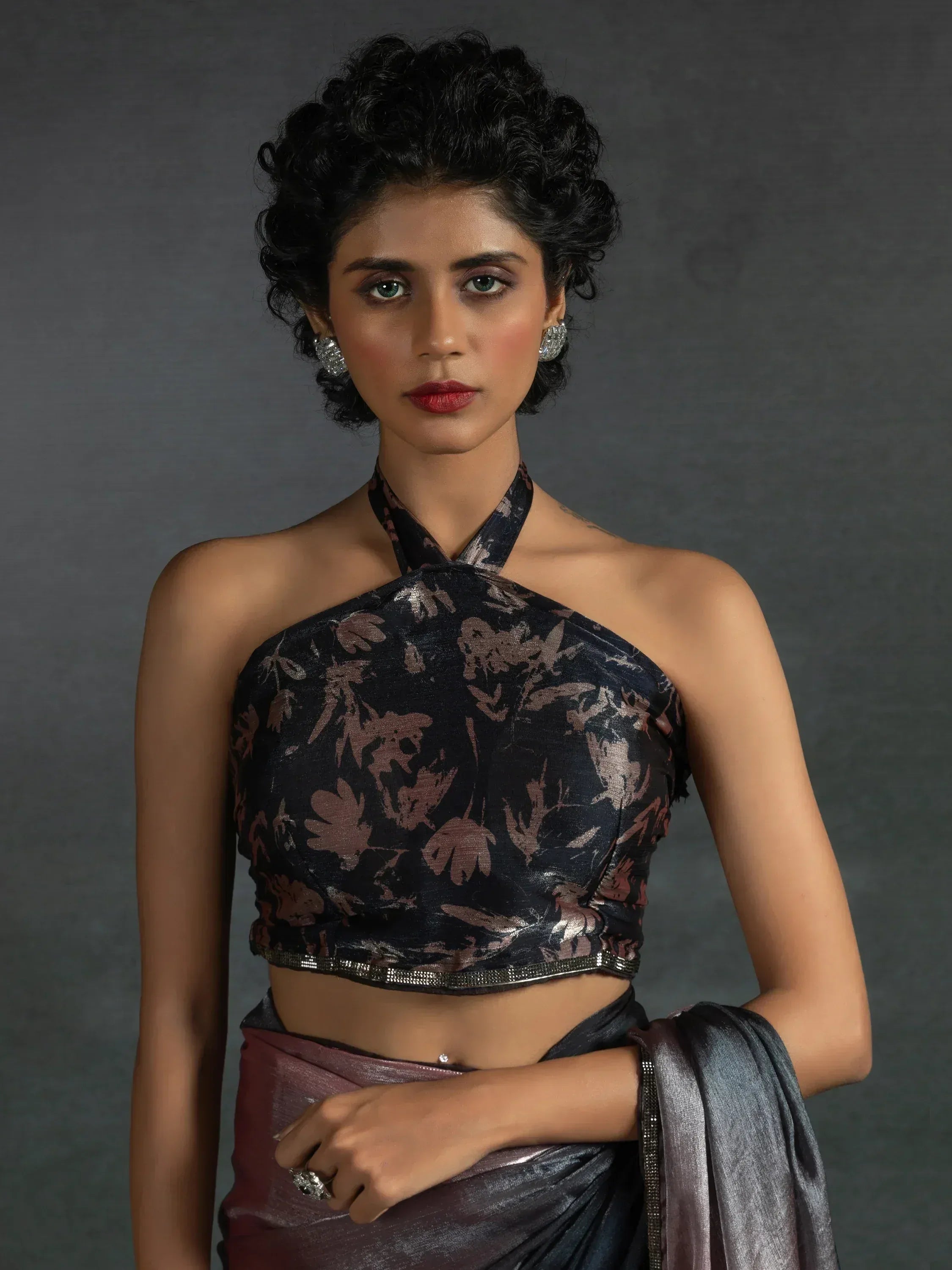 Stylish black floral halter neck blouse with shimmer saree, perfect for Indian ethnic wear occasions