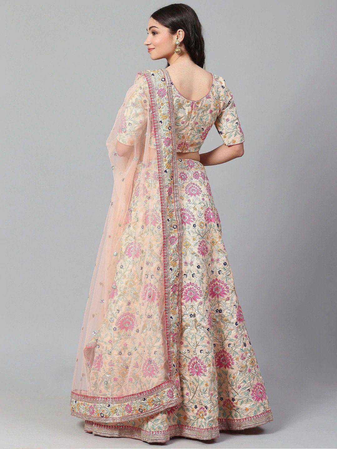 Floral embroidered lehenga choli with pink detailing, perfect for Indian ethnic wear occasions