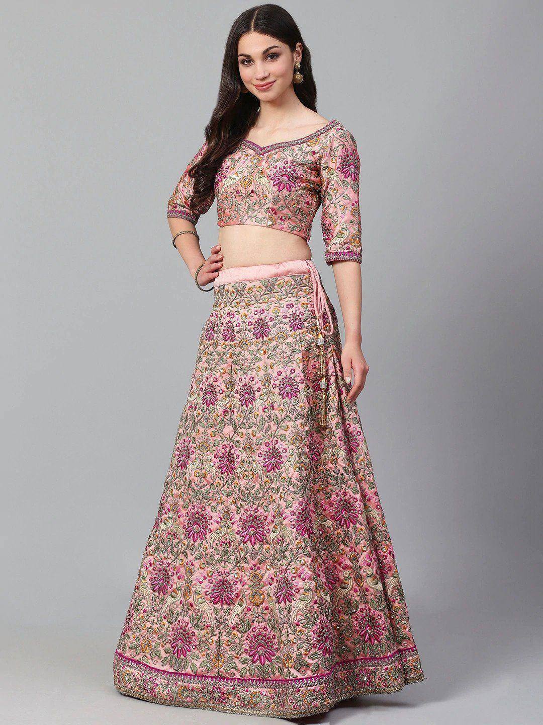 Pink floral embroidered lehenga choli with mirror work, perfect for Indian weddings and festive occasions