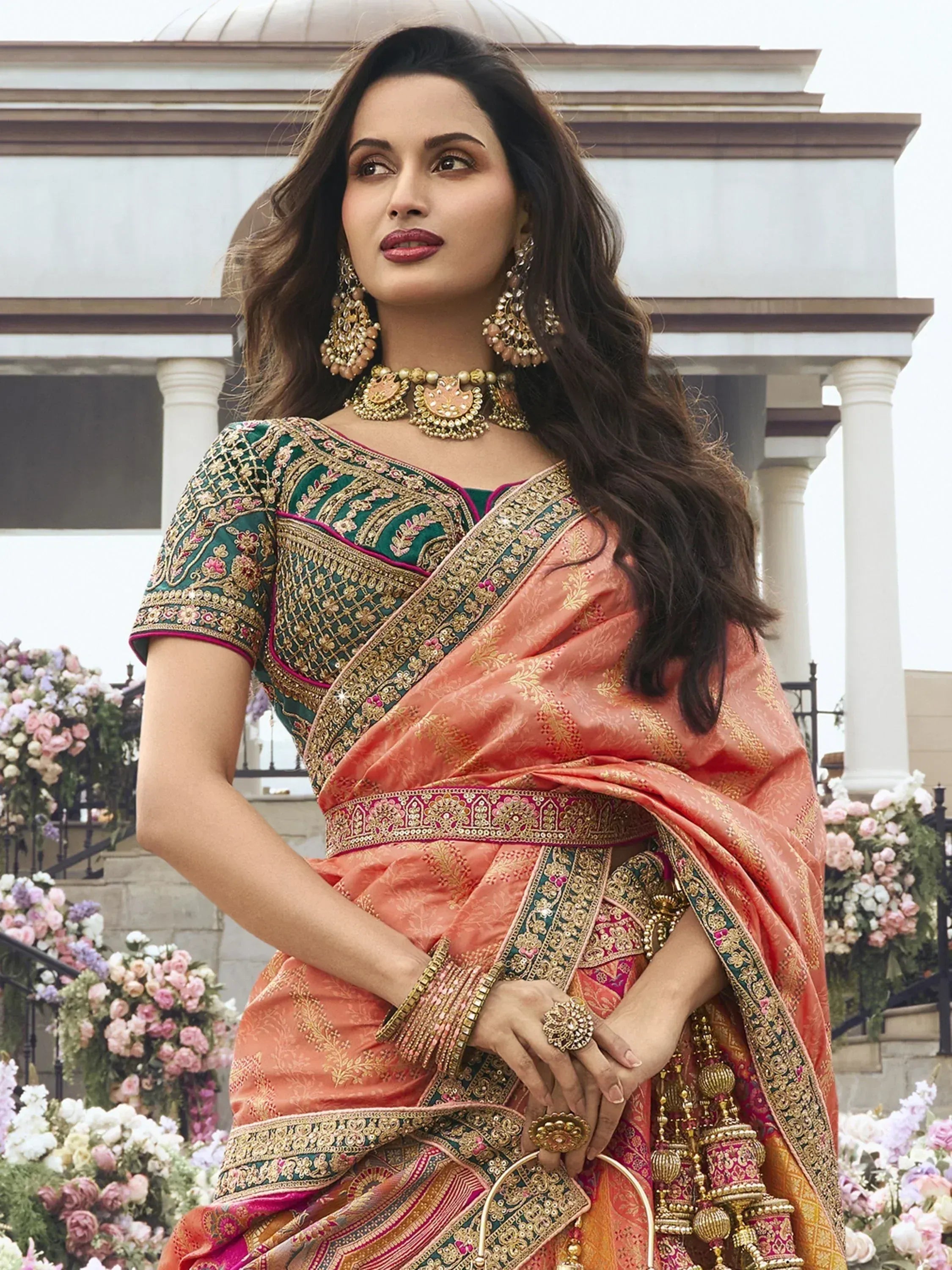 Elegant peach and green embroidered saree with gold detailing, perfect for Indian ethnic occasions