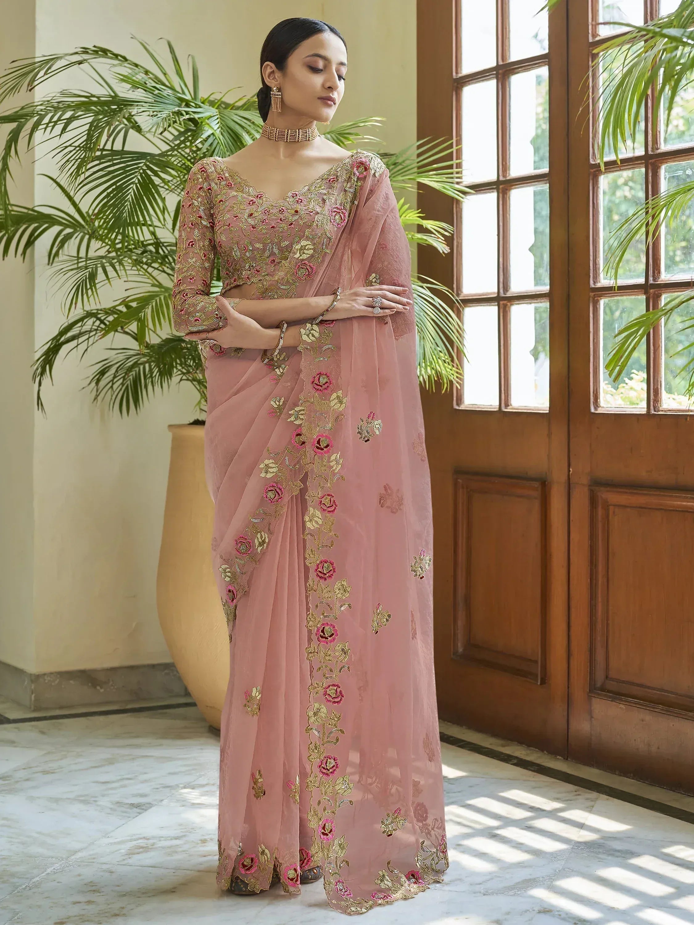 Pink floral embroidered saree with gold detailing, perfect for Indian ethnic occasions