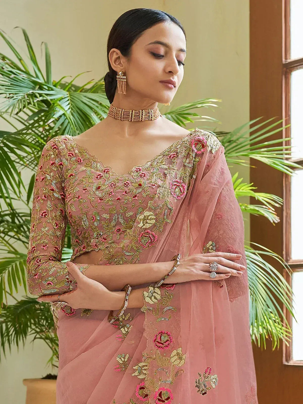 Pink embroidered saree with floral zari work, perfect for Indian ethnic occasions
