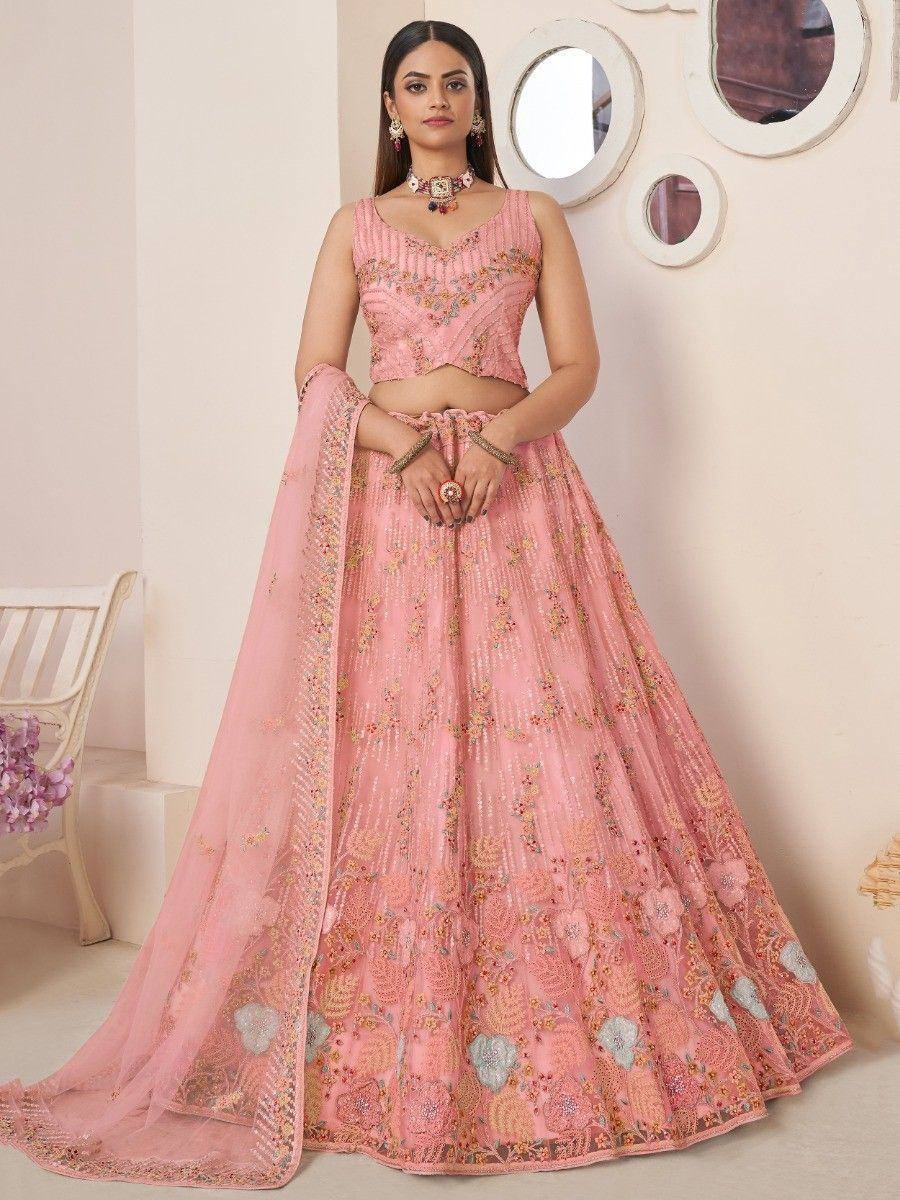 Pink embroidered lehenga choli with floral motifs, perfect for Indian ethnic wear and festive occasions