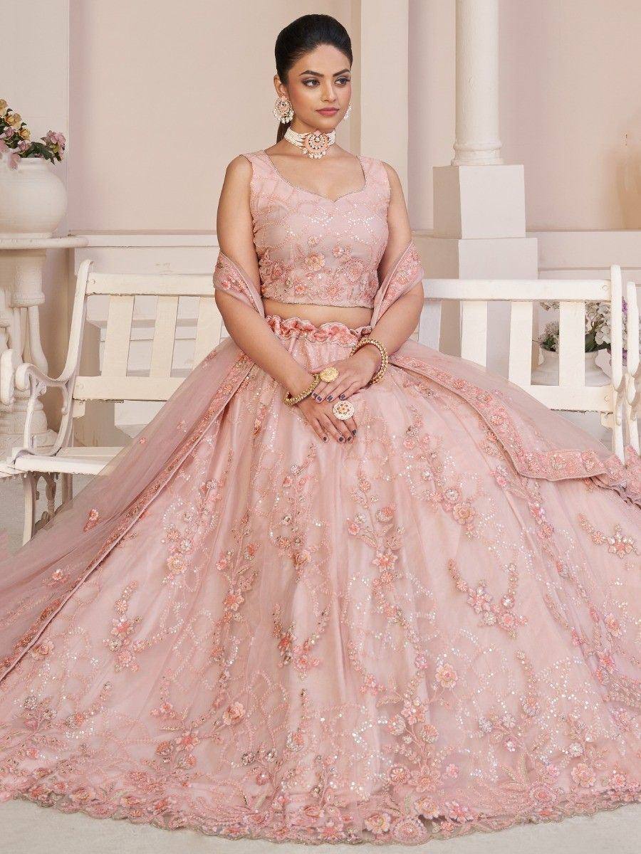 Pink embroidered lehenga choli with floral detailing, perfect for Indian weddings and festive occasions